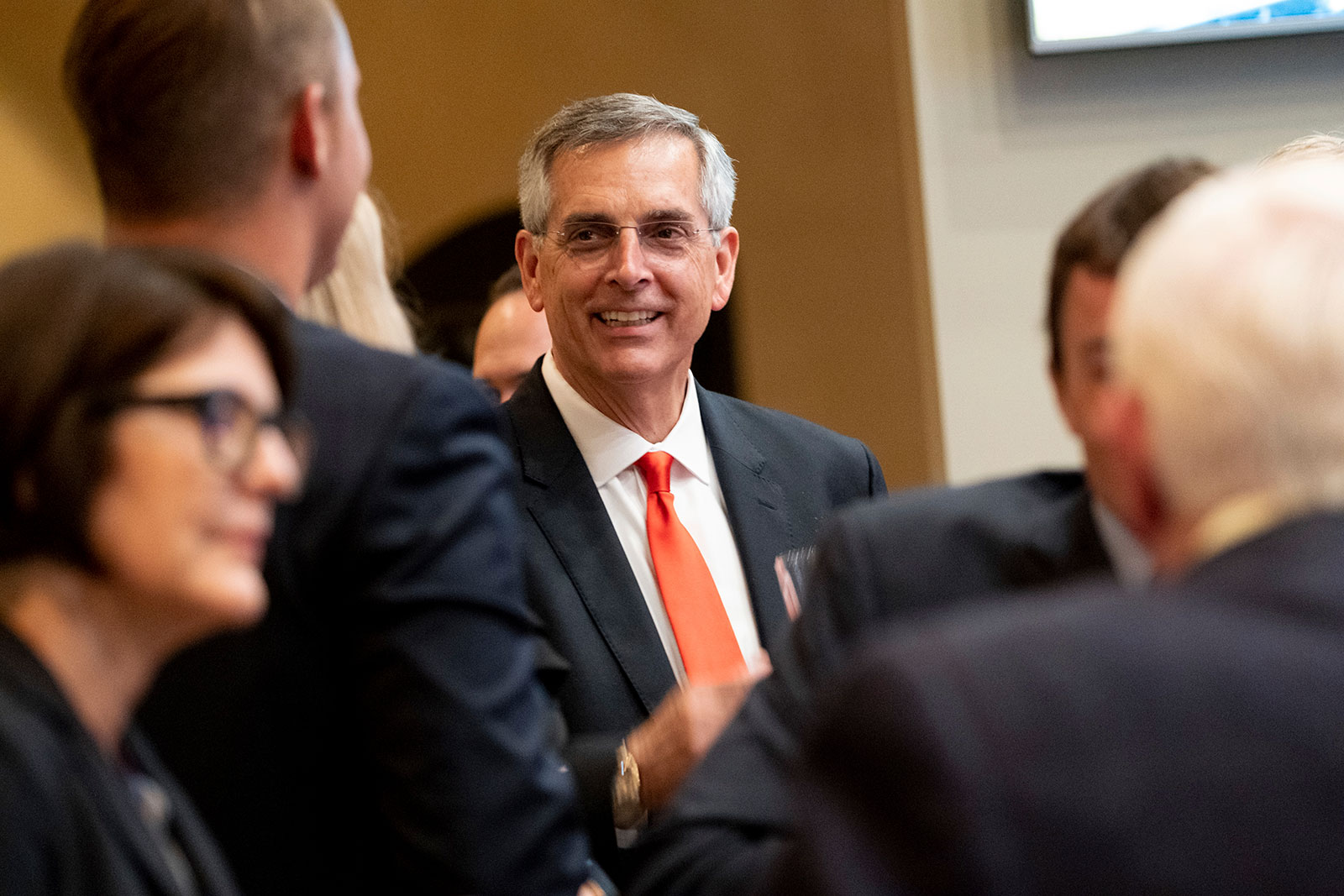 Georgia Secretary of State Brad Raffensperger talks with supporters during an election night party Tuesday evening, May 24, in Peachtree Corners, Georgia.