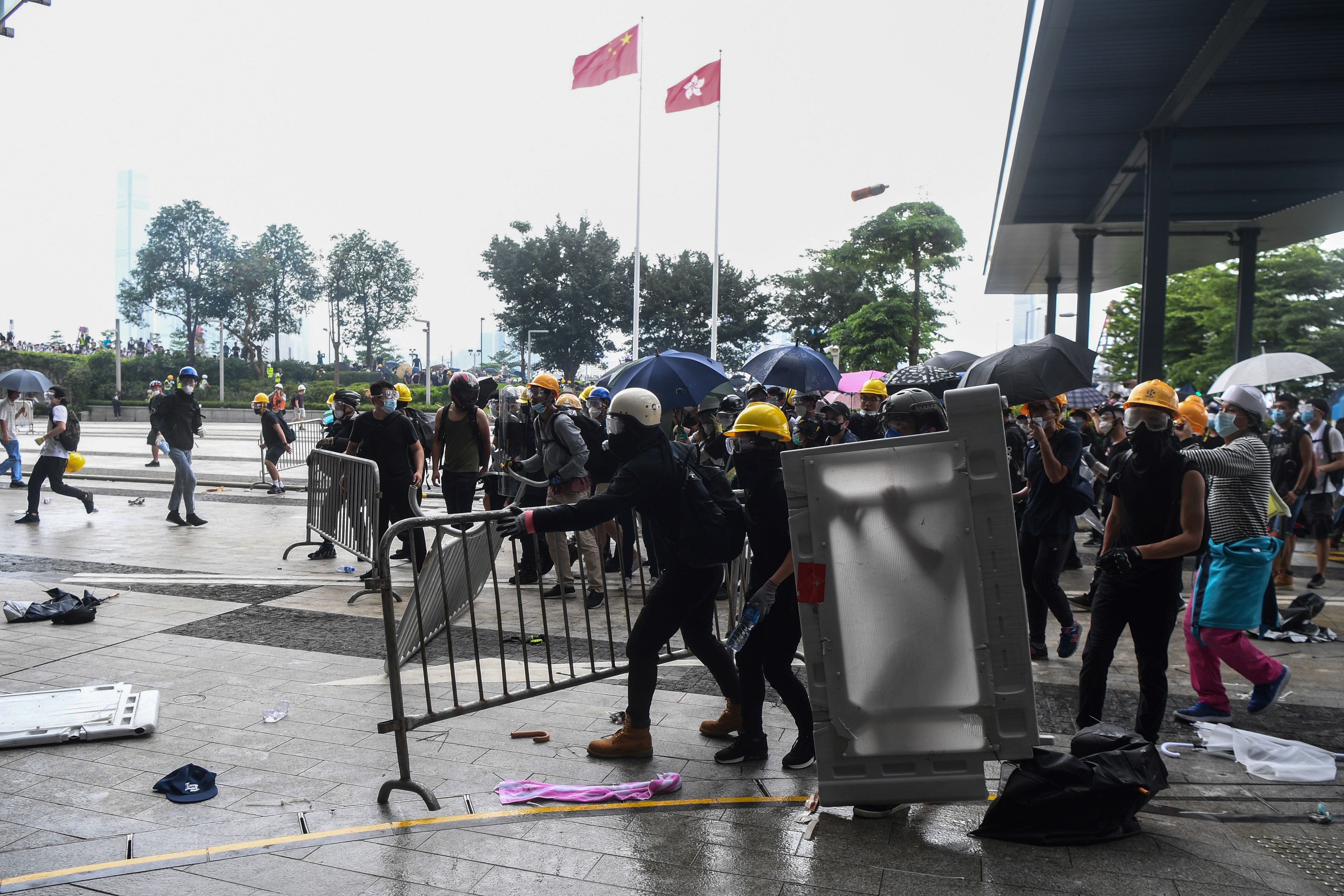 Protesters clash with police during a demonstration outside the Legislative Council Complex in Hong Kong on June 12.