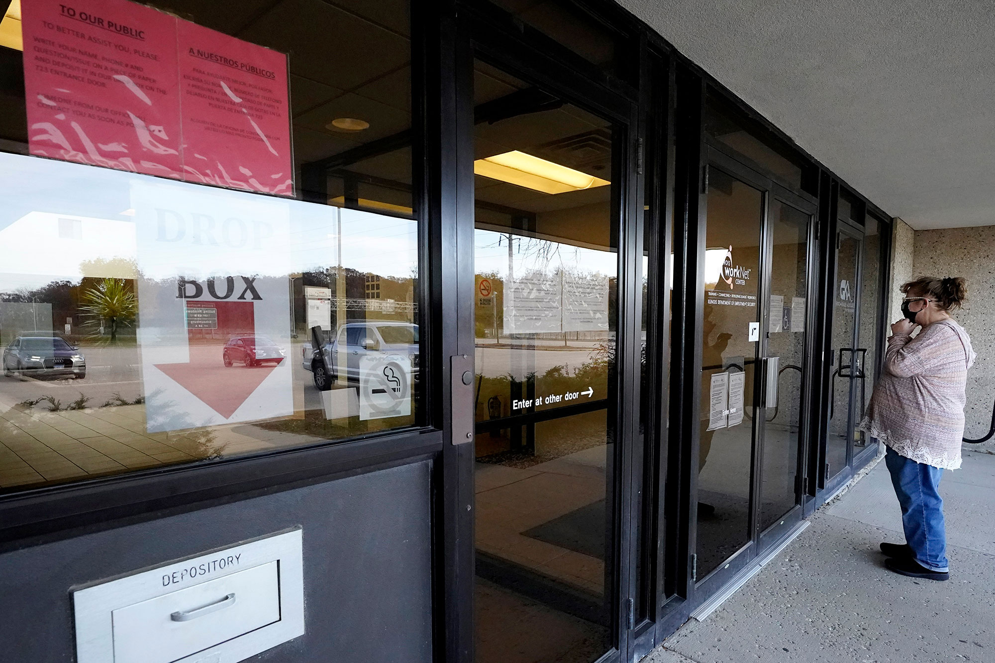 A person checks information displayed at an Illinois Department of Employment Security workNet center in Arlington Heights on November 5.