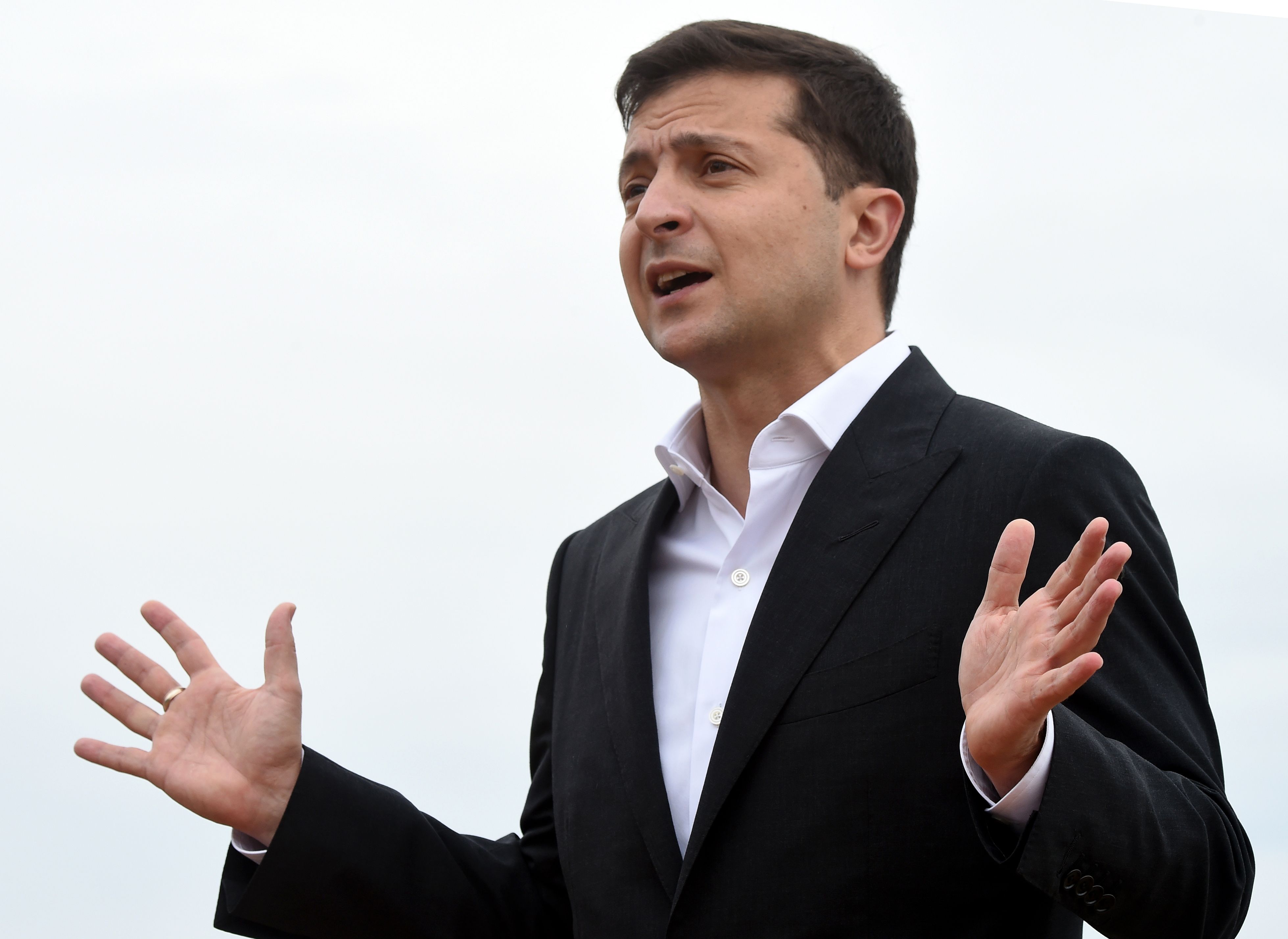 Ukrainian President Volodymyr Zelensky gestures as he speaks after tactical exercises at the National Guard training ground near Stare village on Sept. 30, 2019.