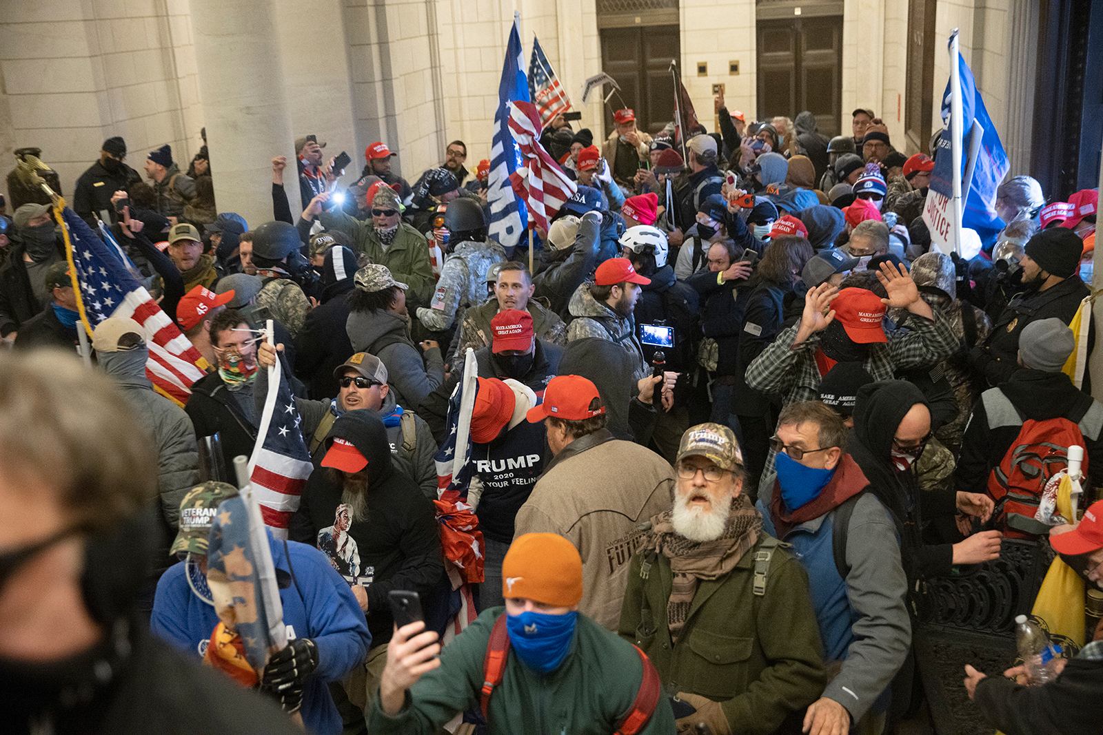 Protesters supporting President Donald Trump gather near the east front door of the US Capitol after groups breached the building's security on January 6, in Washington, DC. 