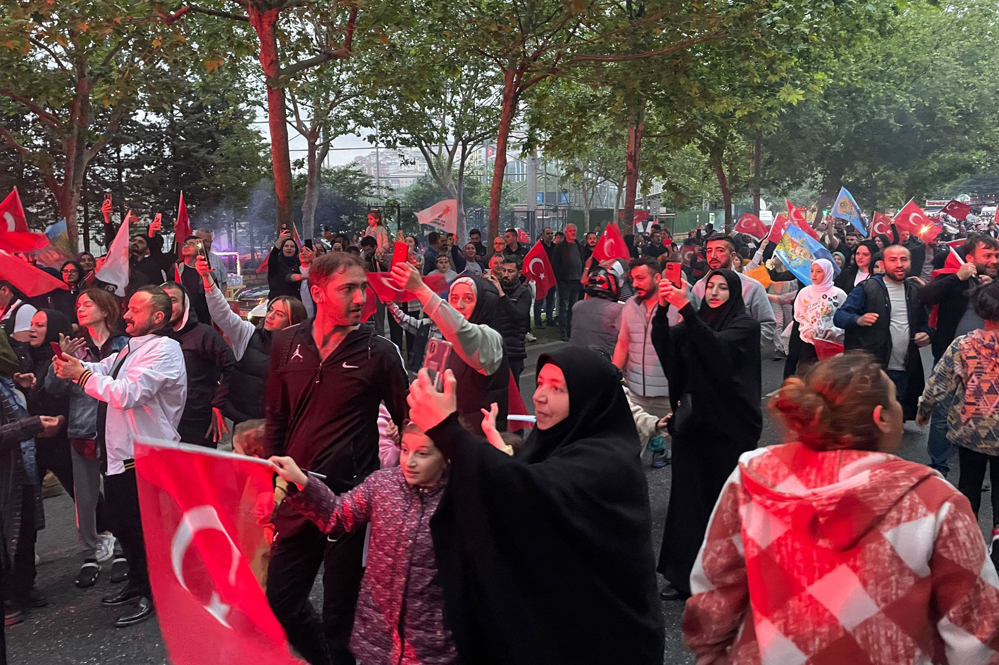 Erdogan supporters gather outside the AKP headquarters after preliminary results showed him in the lead on May 28.