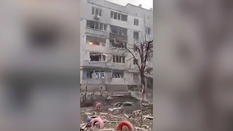 A Russian military strike Tuesday tore through two apartment blocks in Borodjanka, about 50 kilometers (30 miles) from the center of Kyiv.
