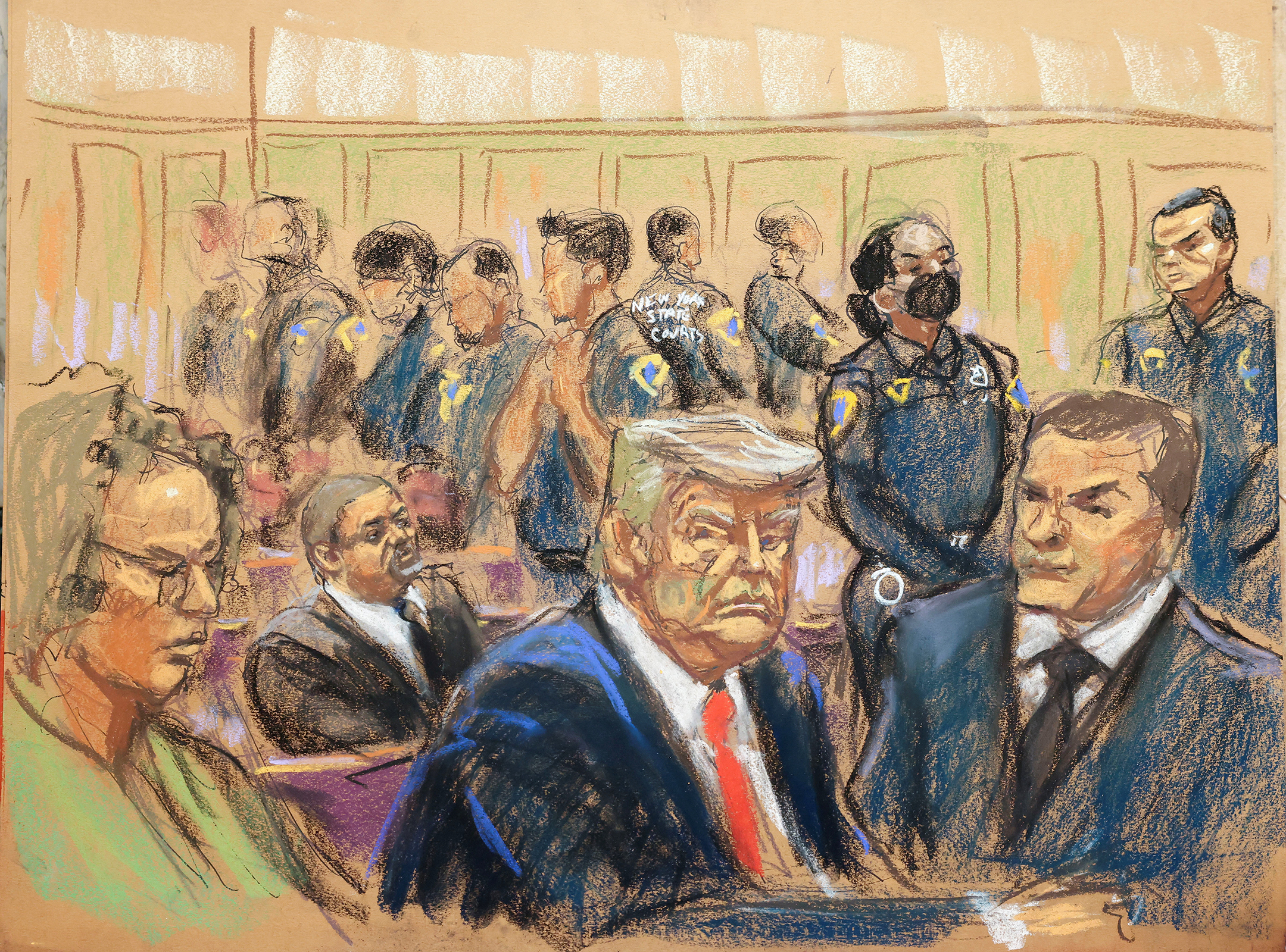Former President Donald Trump appears in court with his legal team for an arraignment on charges stemming from his indictment by a Manhattan grand jury following a probe into hush money paid to porn star Stormy Daniels, in New York City on April 4 in this courtroom sketch.