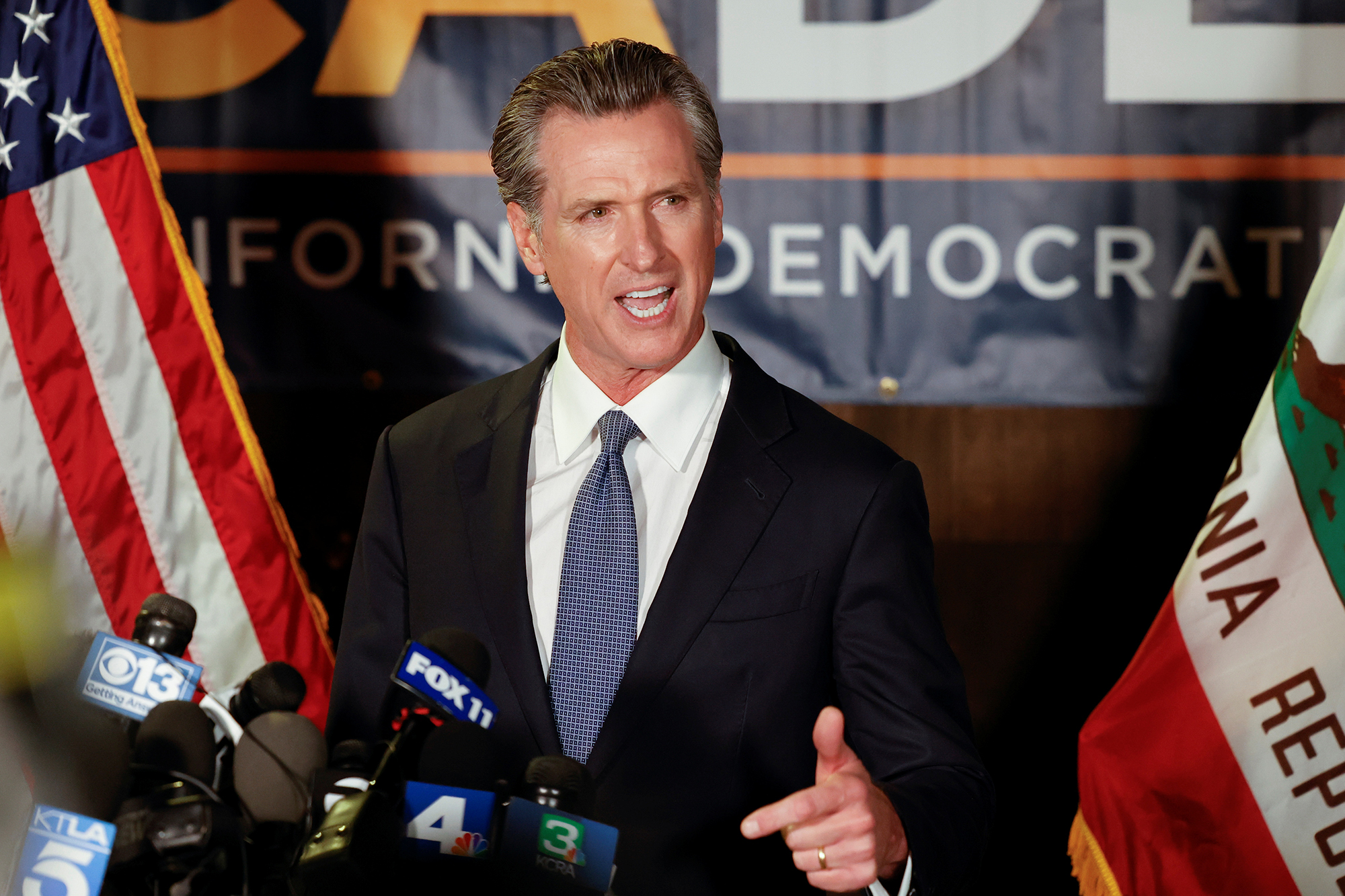California Governor Gavin Newsom makes an appearance after the polls close on the recall election, at the California Democratic Party headquarters in Sacramento, California, U.S., September 14, 2021.