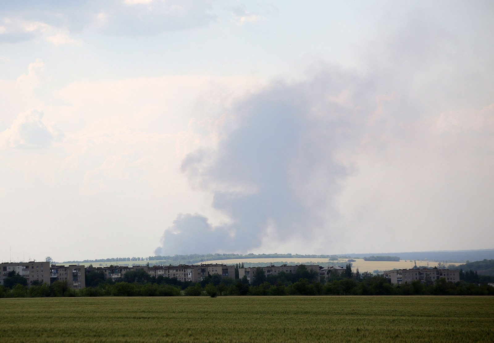Black smoke is seen over the city of Lyman on June 14.