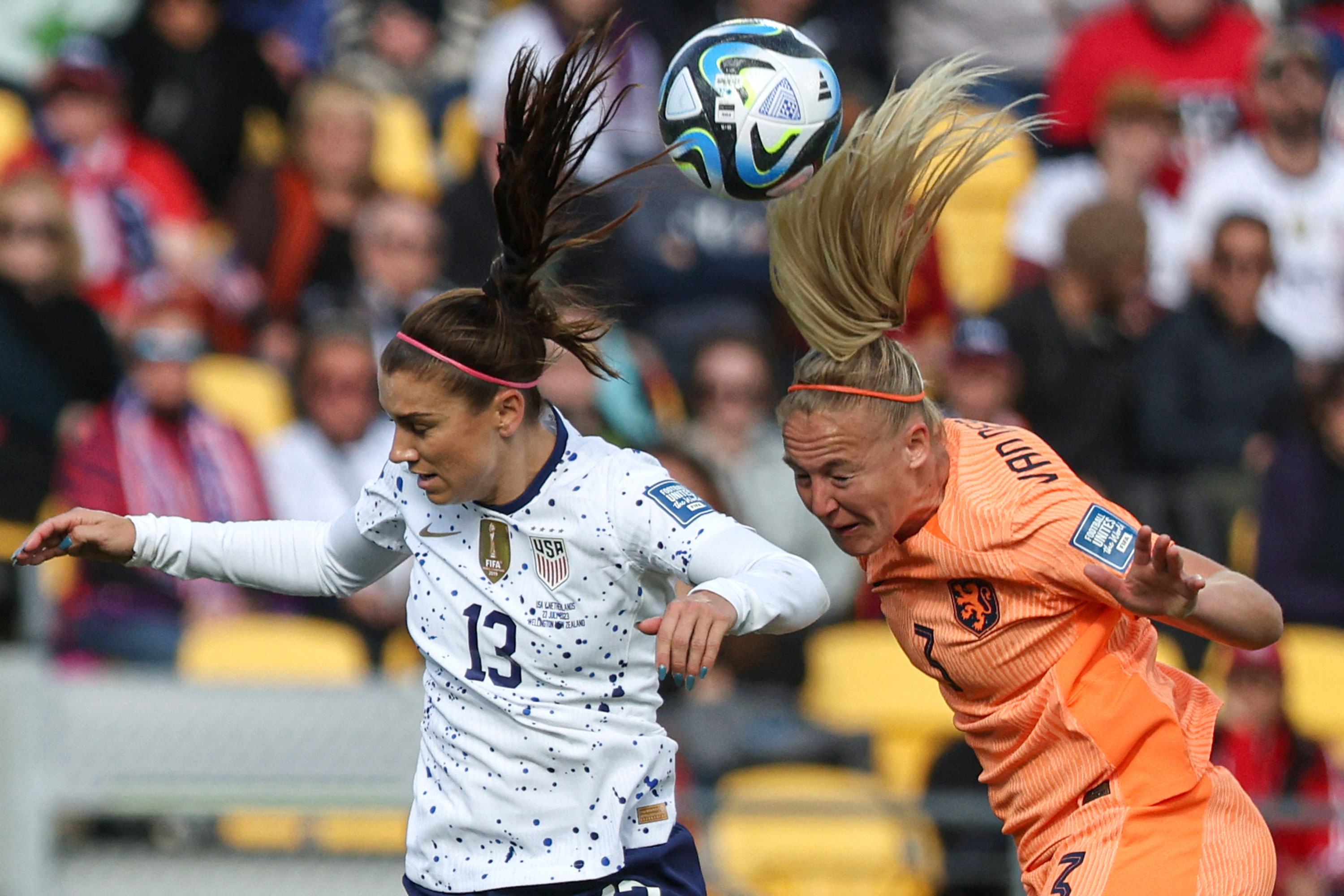 USA's forward Alex Morgan and Netherlands' defender Stefanie van der Gragt fight for the ball.