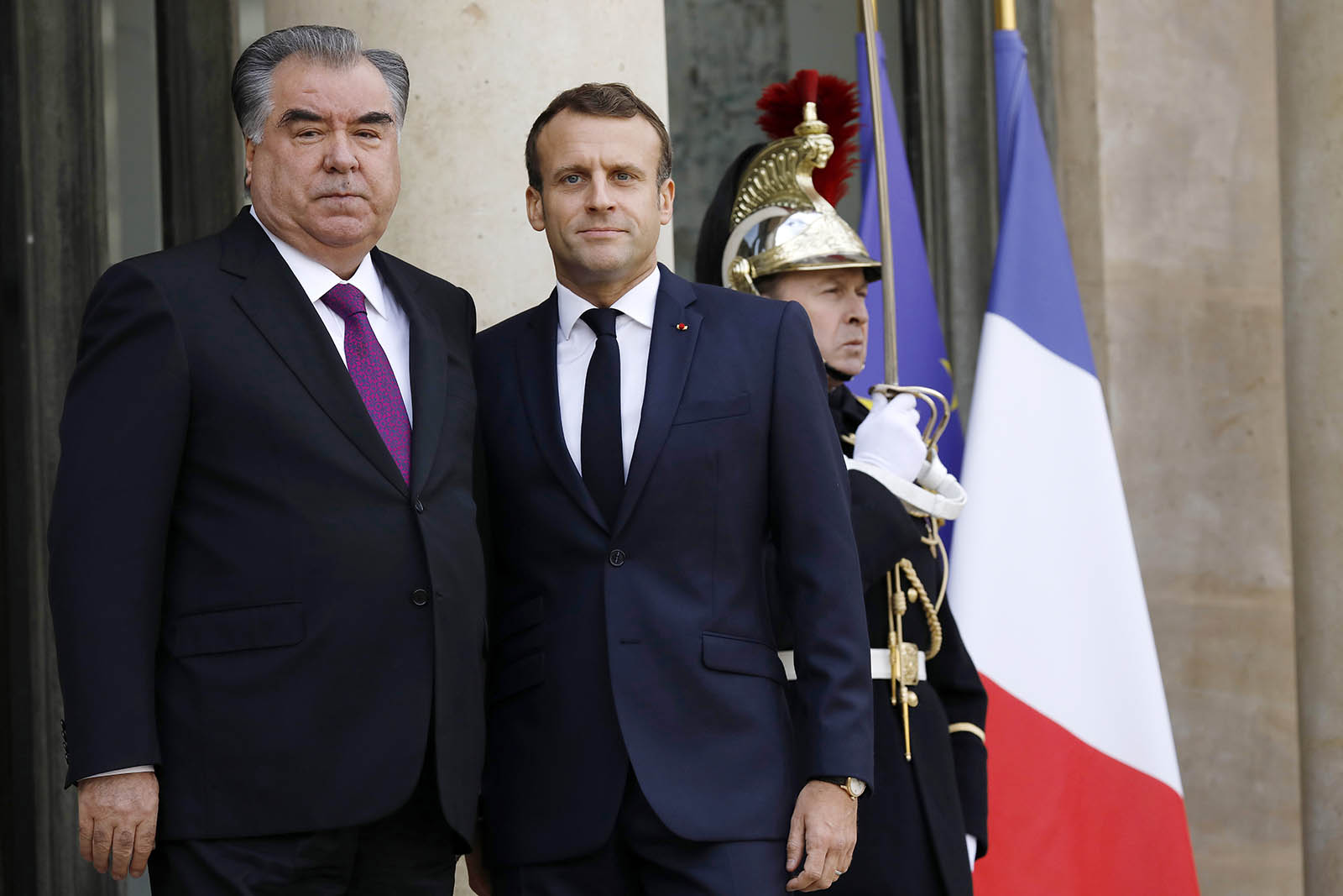 French President Emmanuel Macron, right, is pictured with President of Tajikistan, Emomali Rahmon, at the Elysee Palace in Paris, France, in November 2019.
