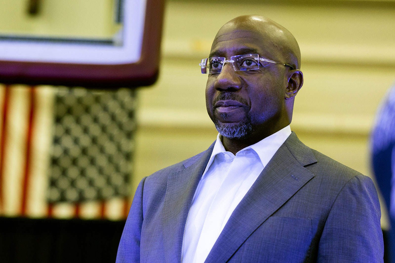 Sen. Raphael Warnock speaks during rapper Lil Baby's charity event at Morehouse College on November 13, in Atlanta.