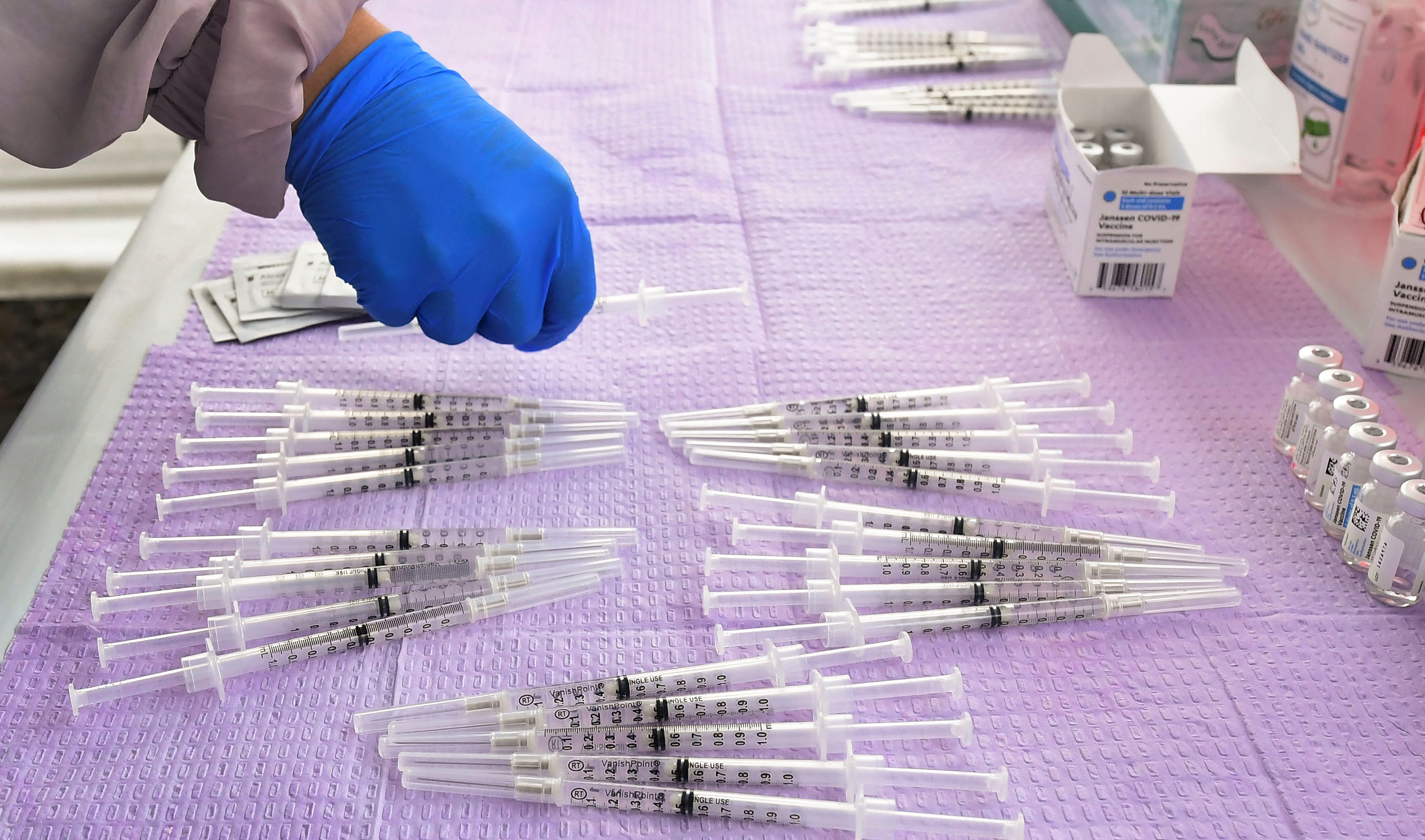Doses of the Johnson & Johnson Covid-19 vaccine are prepared at a clinic in Los Angeles, California, on March 25.  