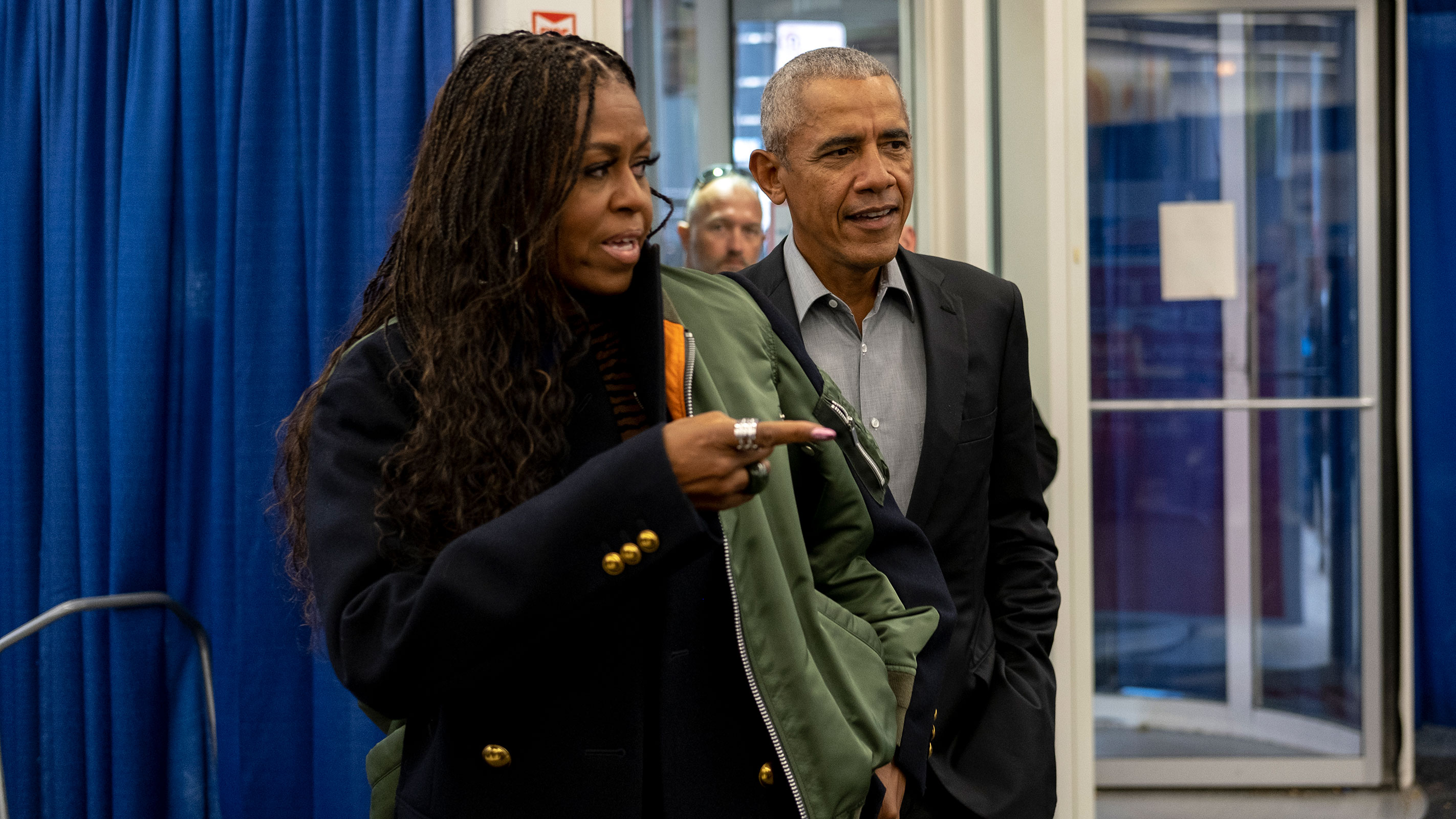 In this October 2022 photo, former first lady Michelle Obama and former President Barack Obama arrive to cast their vote at an early voting venue in Chicago.