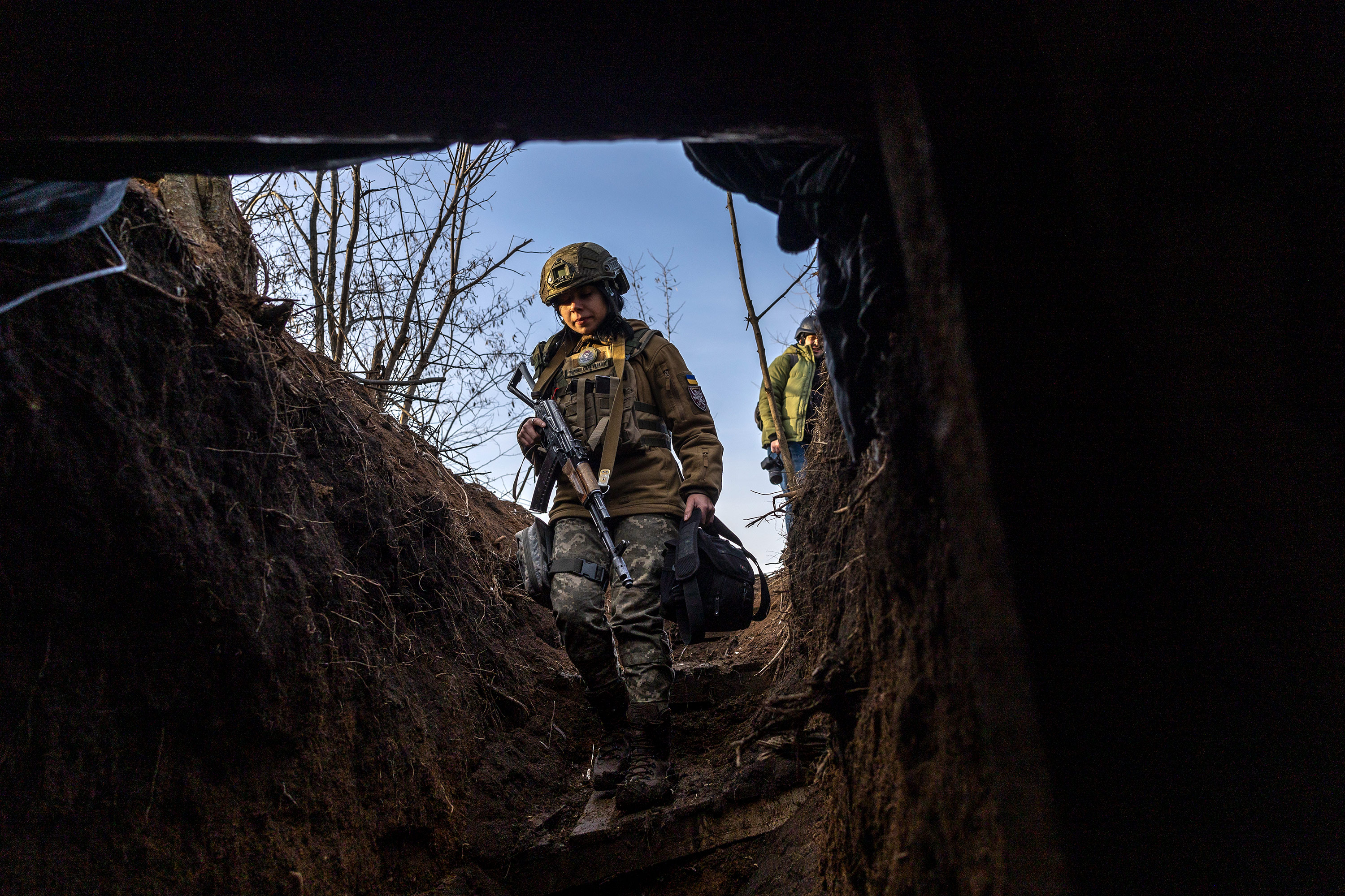 Ukrainian soldiers enter a bunker near Bakhmut, Ukraine, on March 4. 