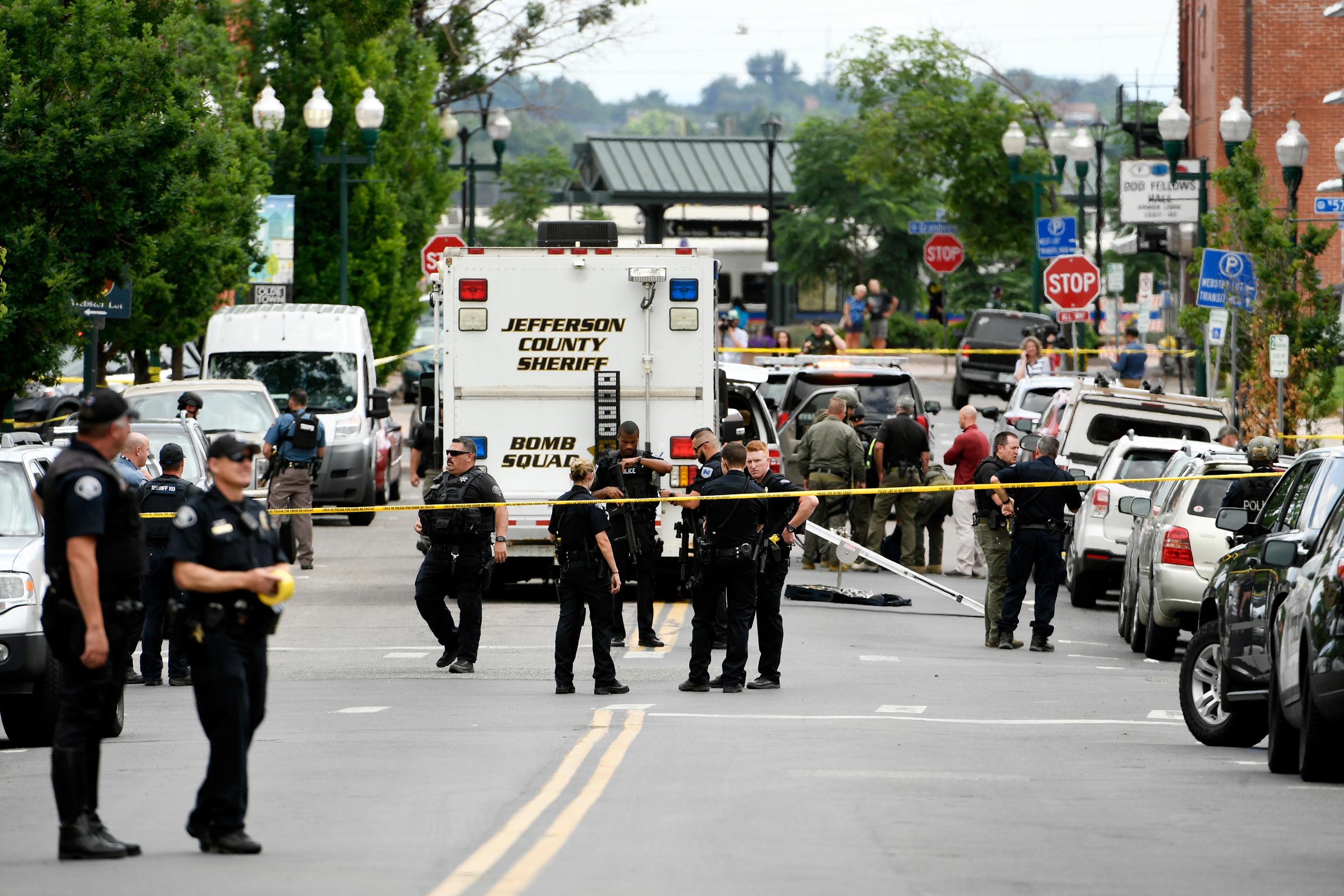 Police officers investigate the scene of an early afternoon shooting in Olde Town Arvada on June 21, 2021 in Arvada, Colorado. 