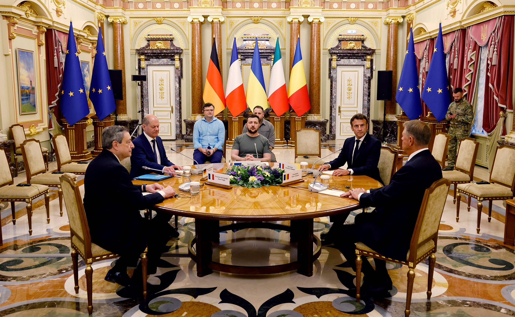 From left, Italian Prime Minister Mario Draghi, German Chancellor Olaf Scholz, Ukrainian President Volodymyr Zelensky, French President Emmanuel Macron and Romanian President Klaus Iohannis meet for a working session in Mariinsky Palace, Kyiv, Ukraine, on June 16.