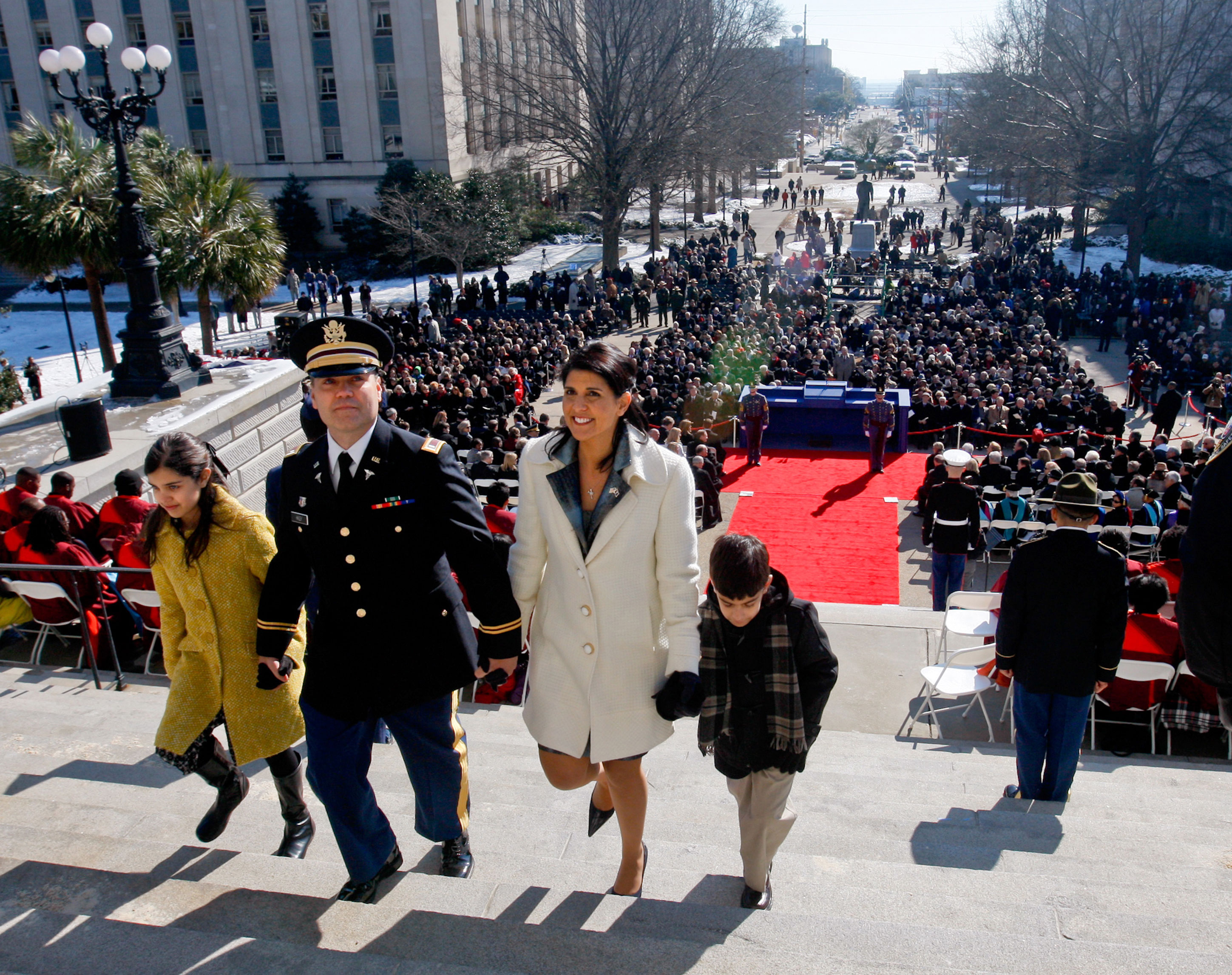 Nikki Haley and her family walk back into the South Carolina State House after her inauguration in 2011. 
