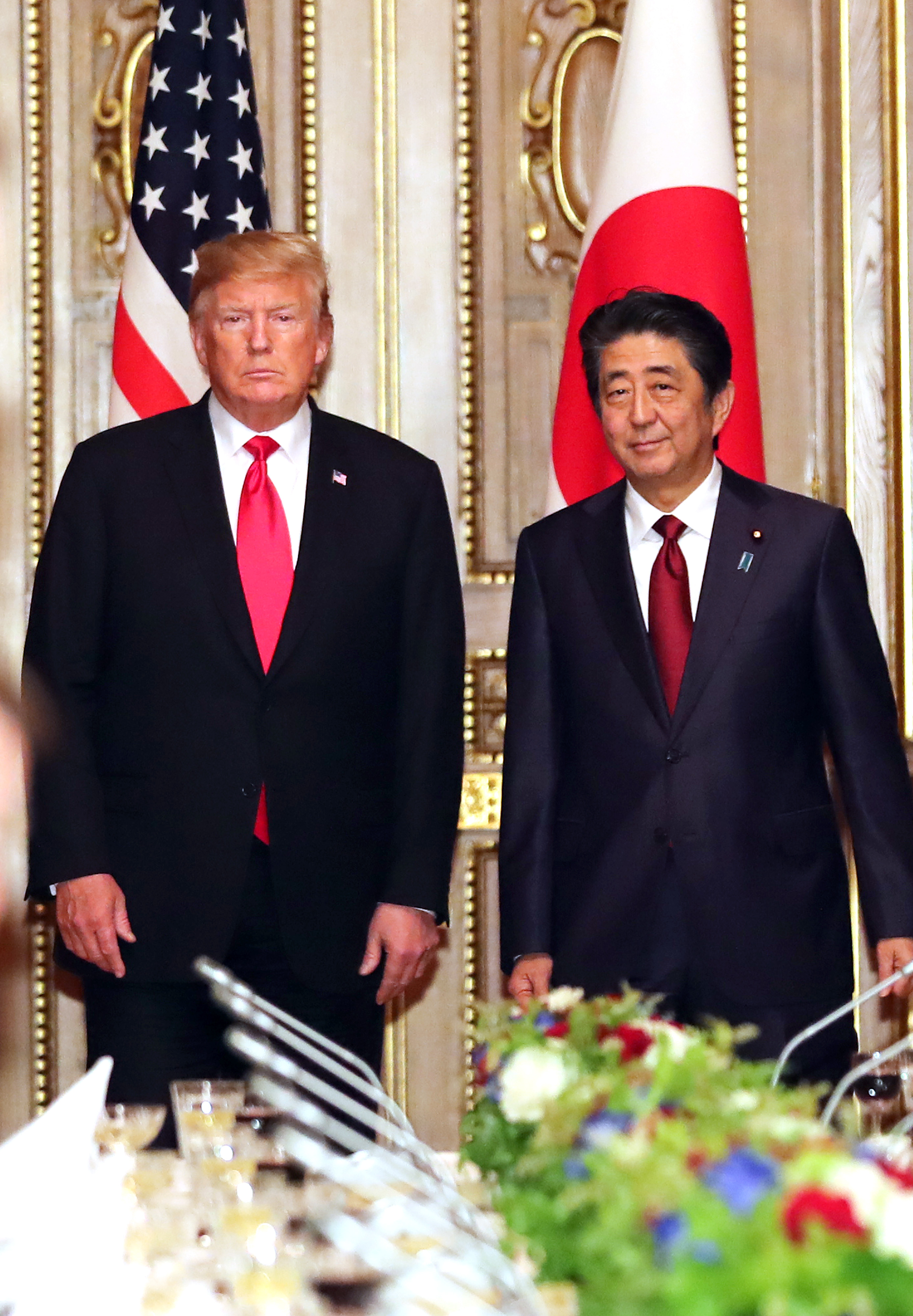 US President Donald Trump and Japanese Prime Minister Shinzo Abe arrive at their working luncheon on May 27, 2019, in Tokyo, Japan. 