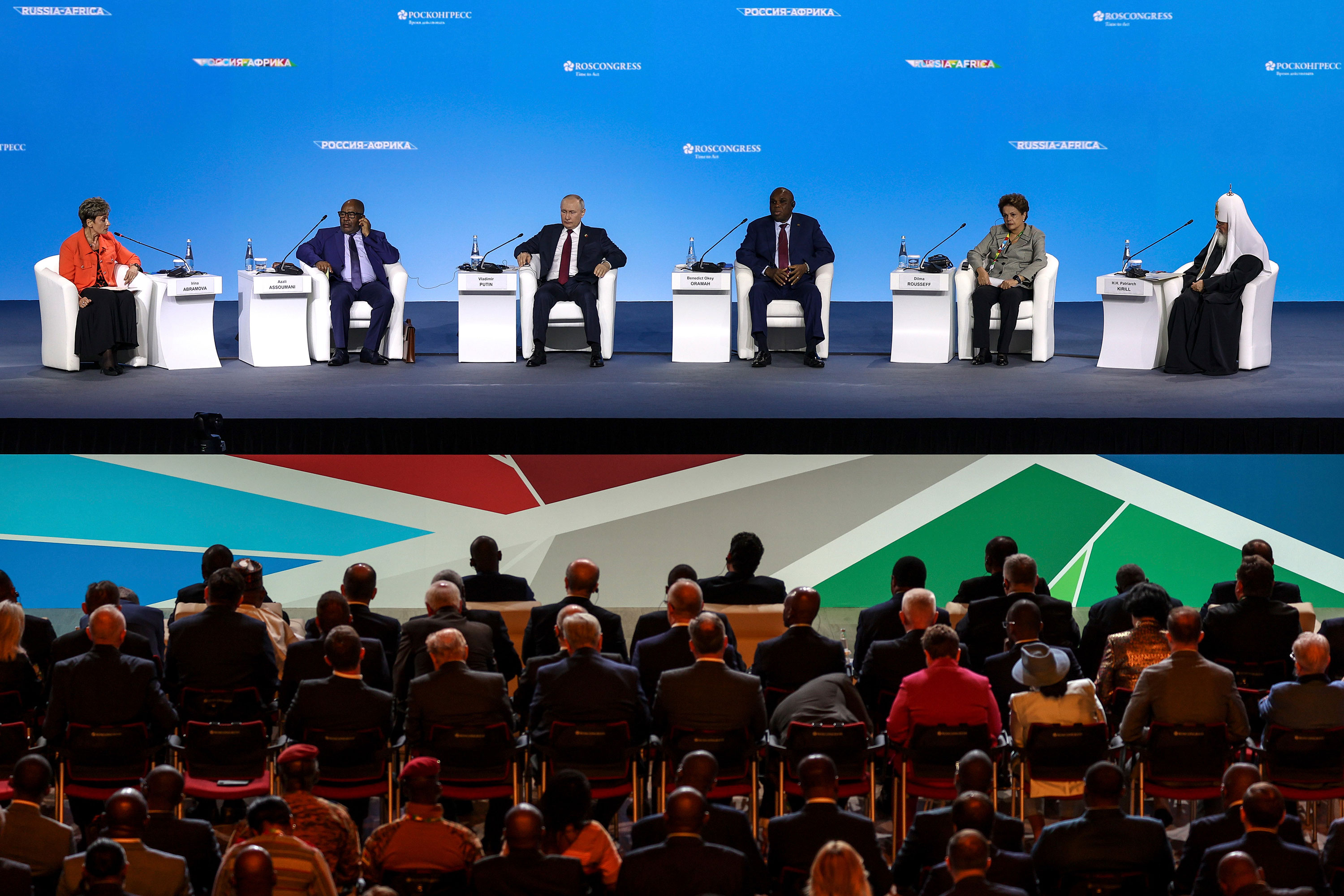 From left: Director of the Institute for African Studies at the Russian Academy of Sciences Irina Abramova, African Union Chairman, President of the Union of the Comoros Azali Assoumani, Russian President Vladimir Putin, Chairman of the Board of Directors at African Export-Import Bank Benedict Okey Oramah, New Development Bank President Dilma Rousseff and head of the Russian Orthodox Church Patriarch Kirill attend a plenary session of the Russia-Africa Summit and Economic and Humanitarian Forum in St. Petersburg on Thursday.