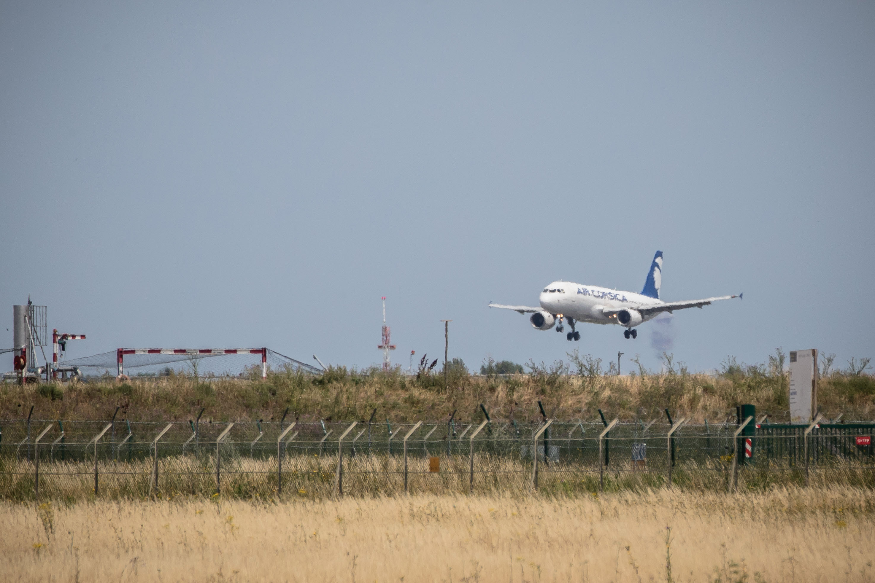 An Air Corsica aircraft lands at Paris Orly Airport near Paris on June 26.