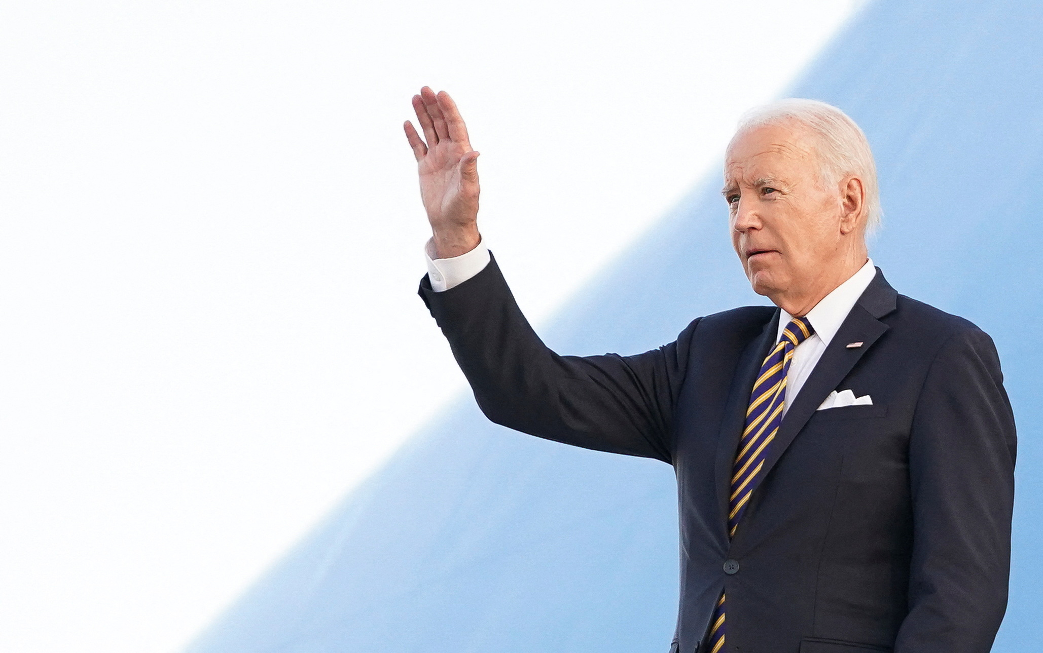 US President Joe Biden waves upon arrival in Helsinki, Finland, on July 12, 2023.