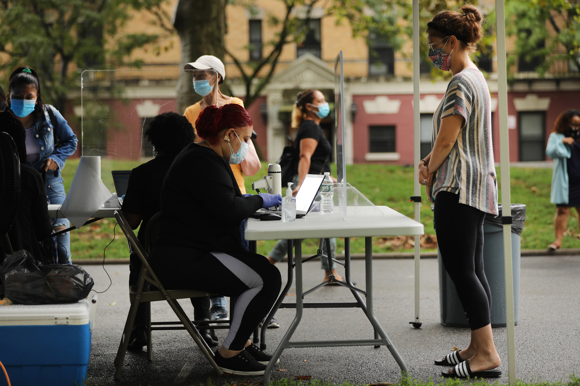 People line-up to take a Covid-19 test in the Sunset Park neighborhood on August 13 in New York City. 