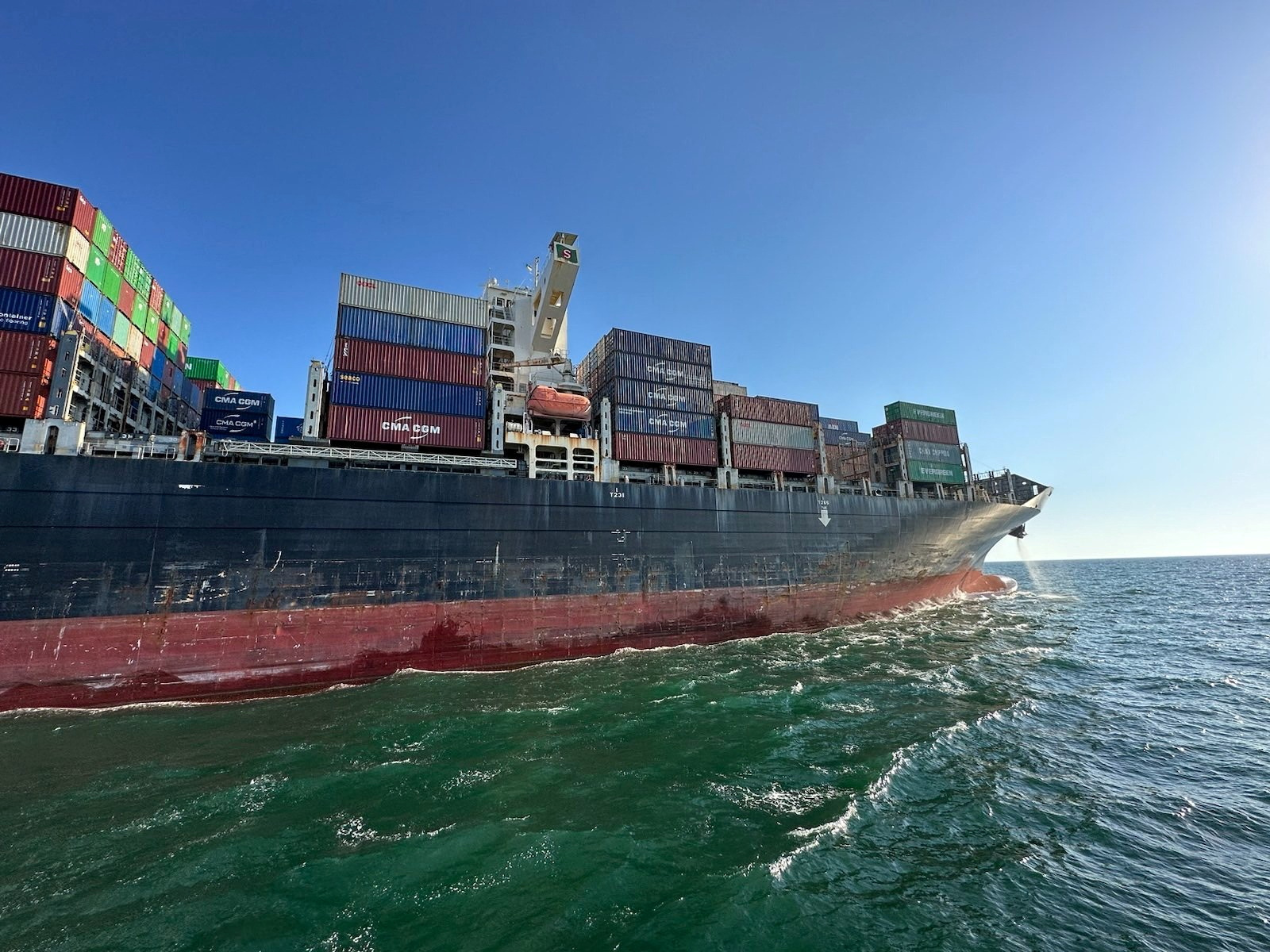 Hong Kong-flagged container ship Joseph Schulte leaves the sea port, in Odesa, Ukraine, in this handout picture released August 16.
