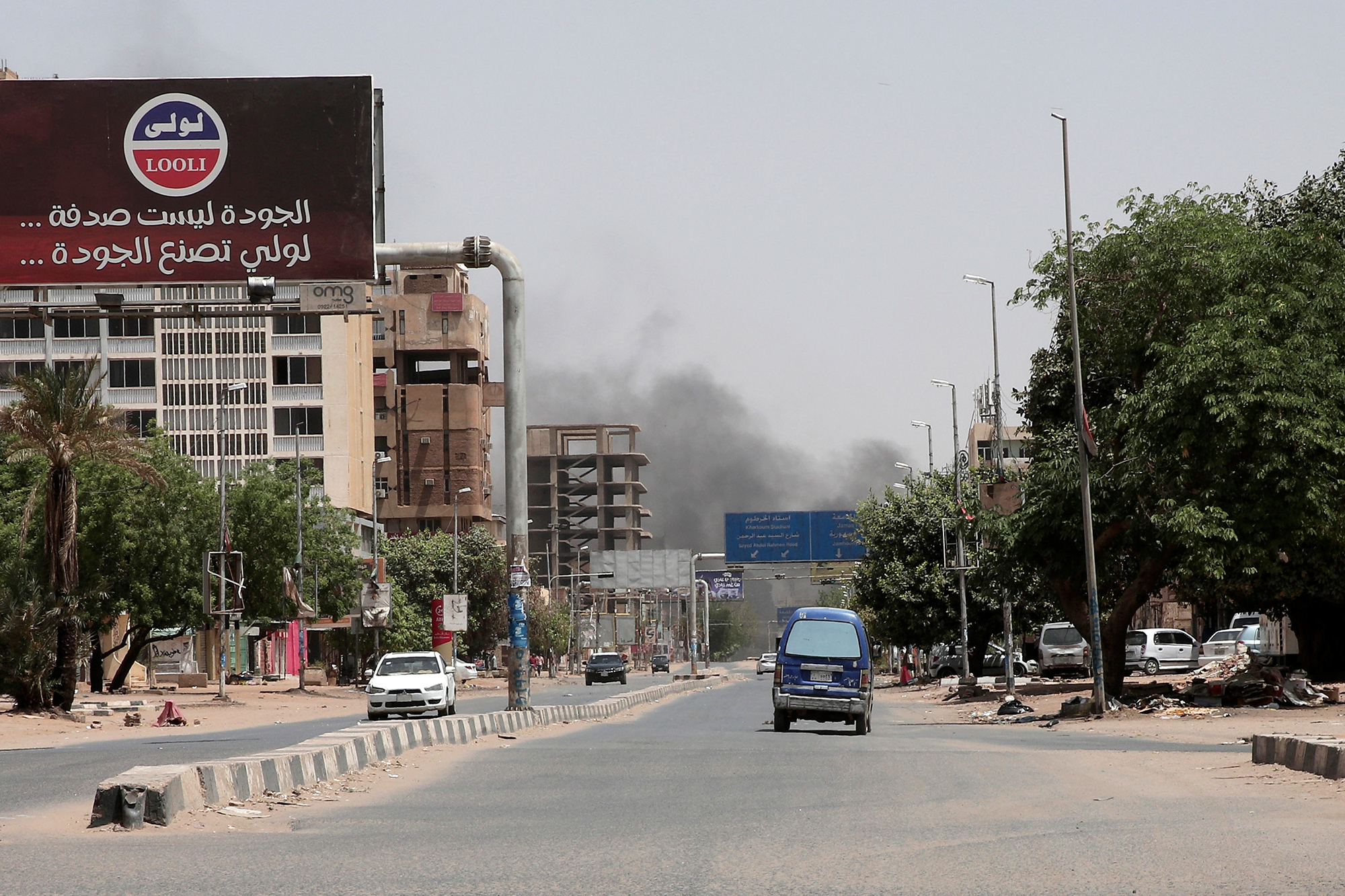 Smoke is seen rising from a neighborhood in Khartoum, Sudan, on Saturday, April 15. 