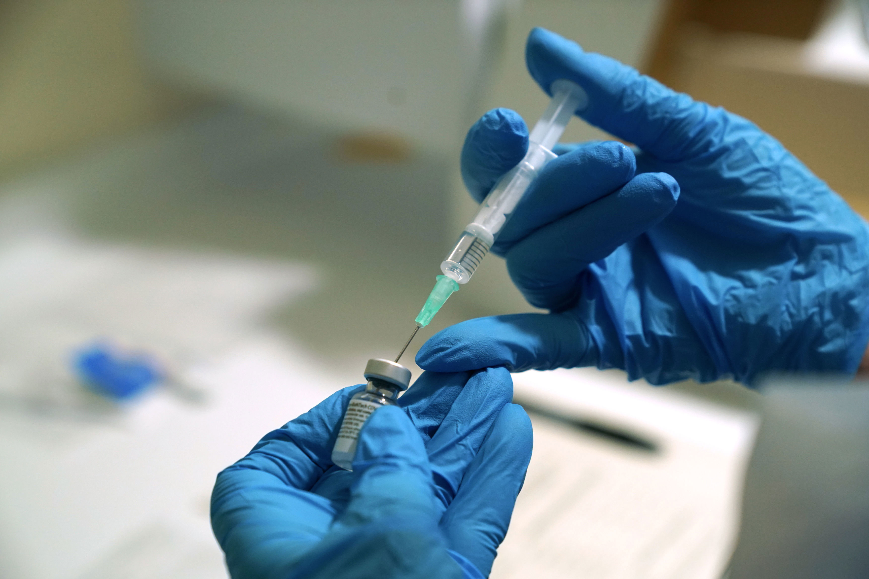 A needle is filled from a vial of the Pfizer-BioNTech Covid-19 vaccine in Newcastle, England, on December 8.