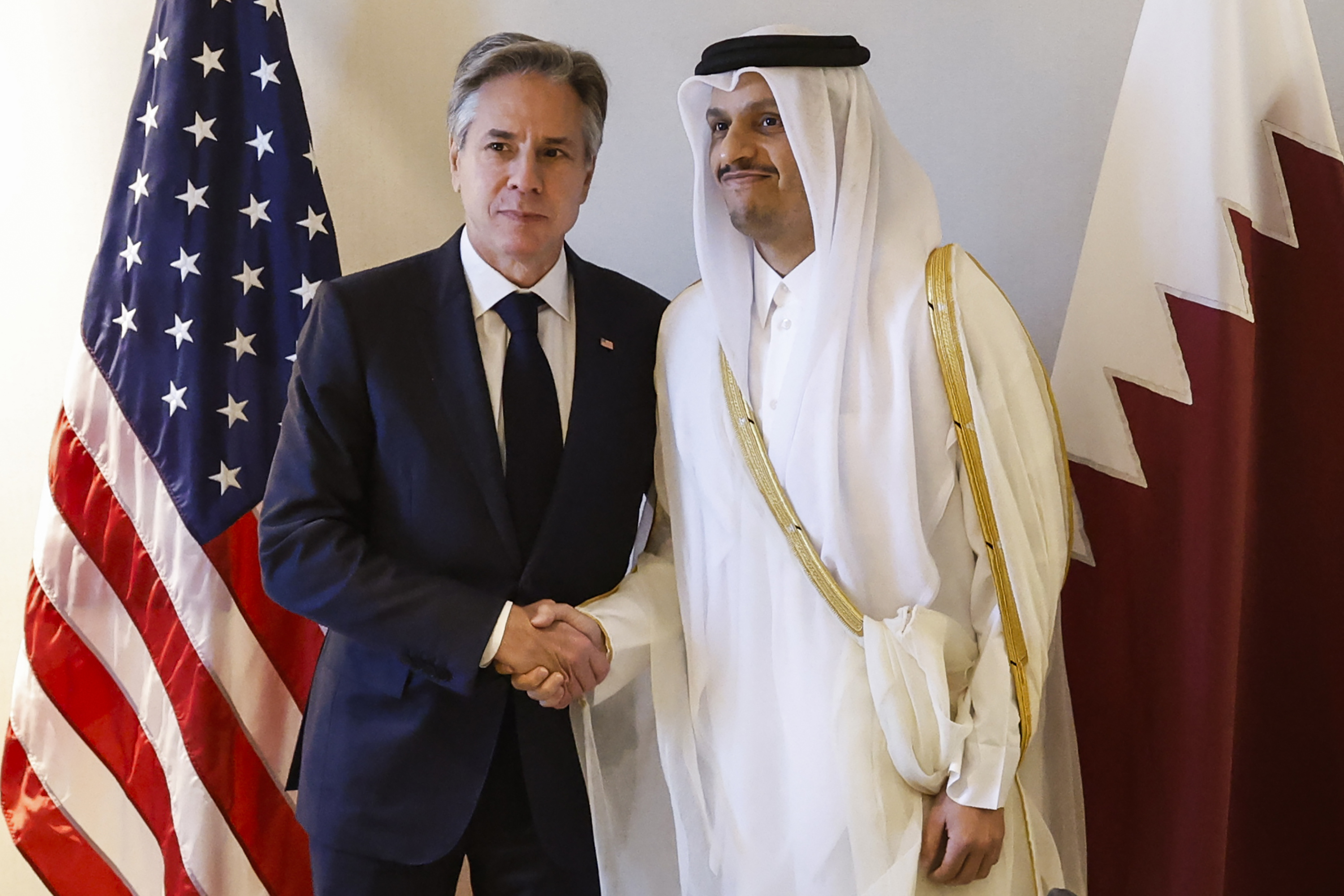 US Secretary of State Antony Blinken, left, meets with Qatari Prime Minister and Minister of Foreign Affairs Mohammed bin Abdulrahman Al Thani at a hotel during a day of meeting, in Amman, Jordan, on Saturday, November 4.