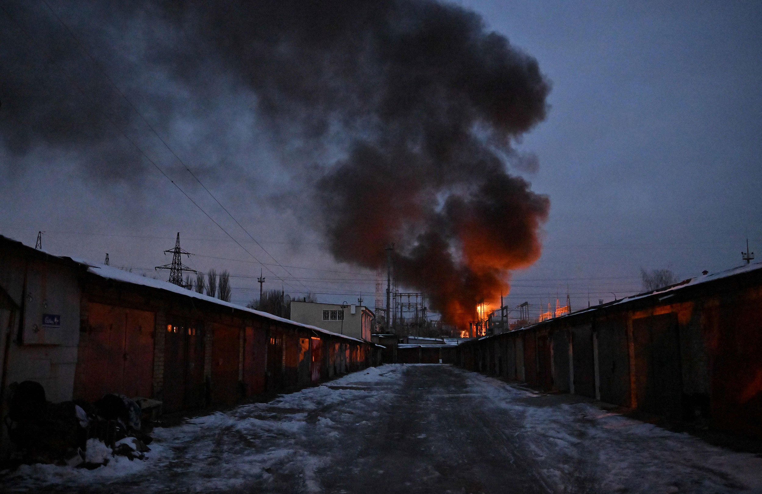 A critical infrastructure facility burns after a Russian drone attack early Monday morning in Kyiv.