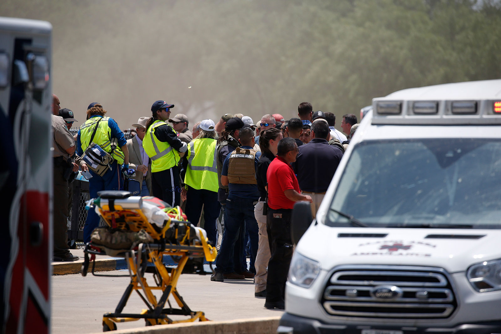 Emergency personnel gather near Robb Elementary School following a shooting on May 24, in Uvalde, Texas. 