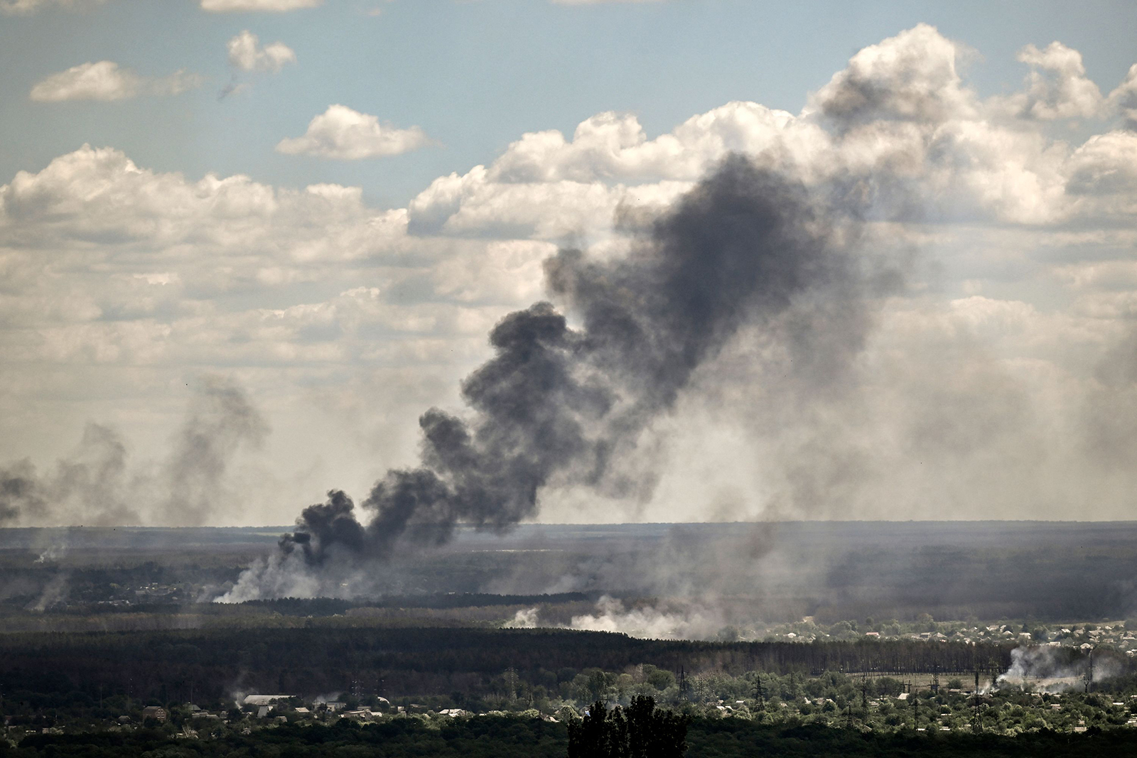 Smoke and dirt rise from shelling in the city of Severodonetsk during fight between Ukrainian and Russian troops in the eastern Ukrainian region of Donbas on June 7.