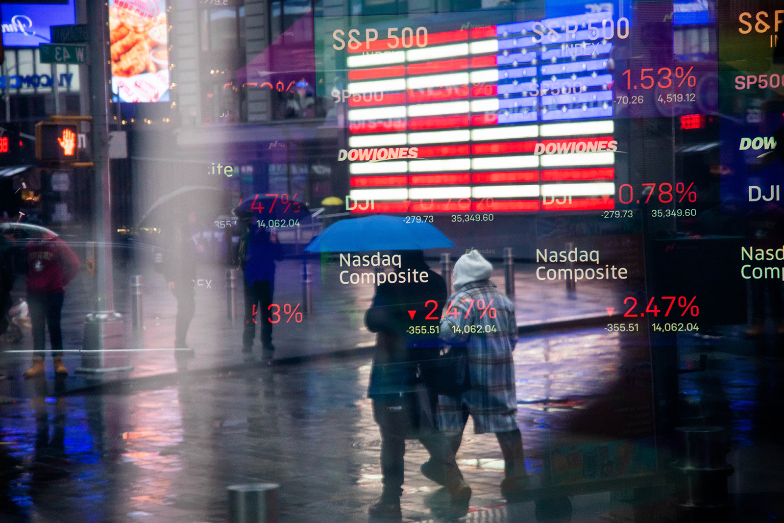 Stock market information is displayed at the Nasdaq MarketSite in New York on February 3.