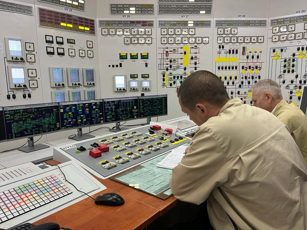 Employees work at the Russian-controlled Zaporizhzhia nuclear power plant during a visit by members of the International Atomic Energy Agency (IAEA) mission on September 2.