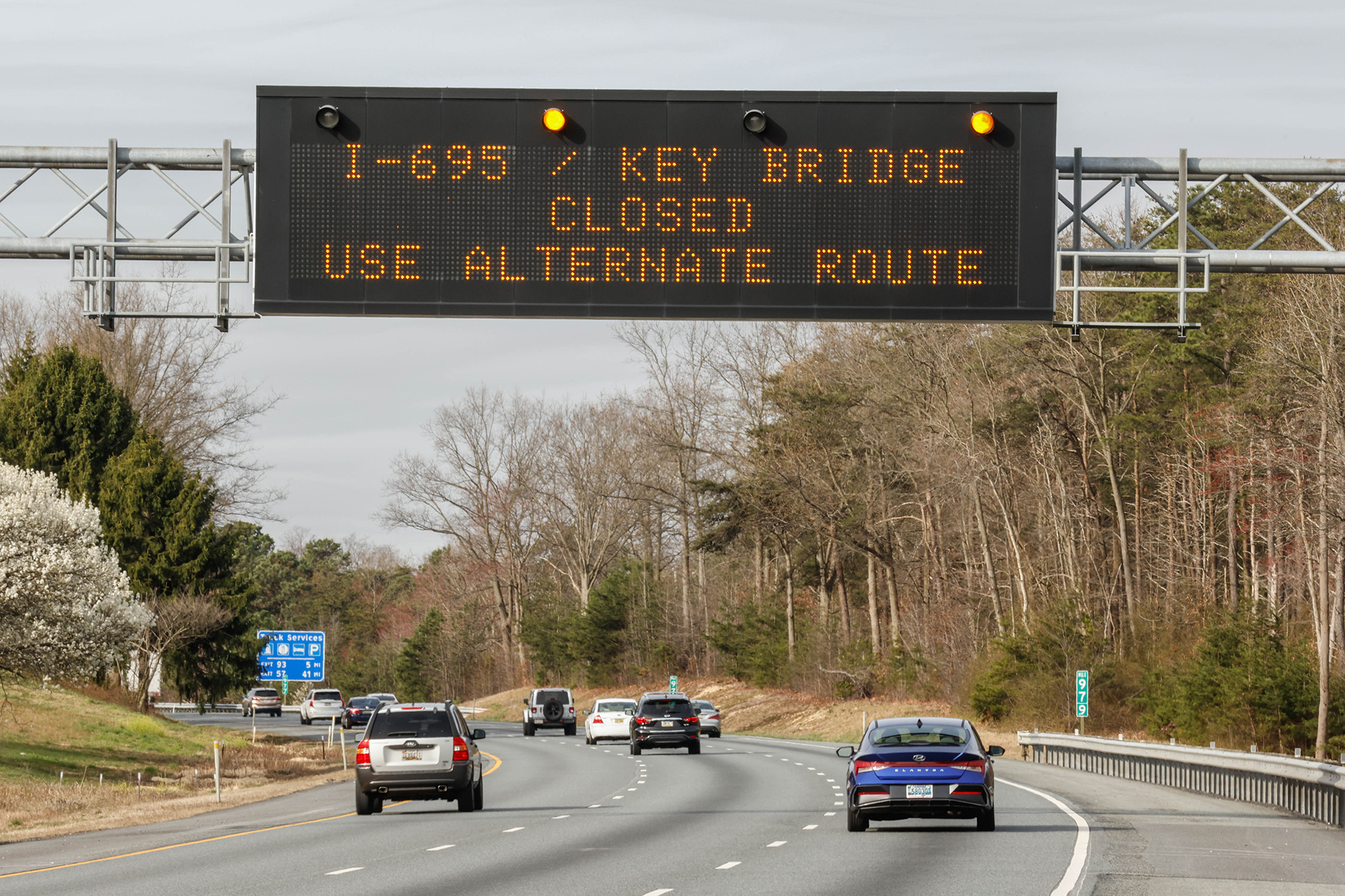 A traffic warning sign is displayed on Route 95 after a cargo ship collided with the Francis Scott Key Bridge causing it to collapse on March 26.