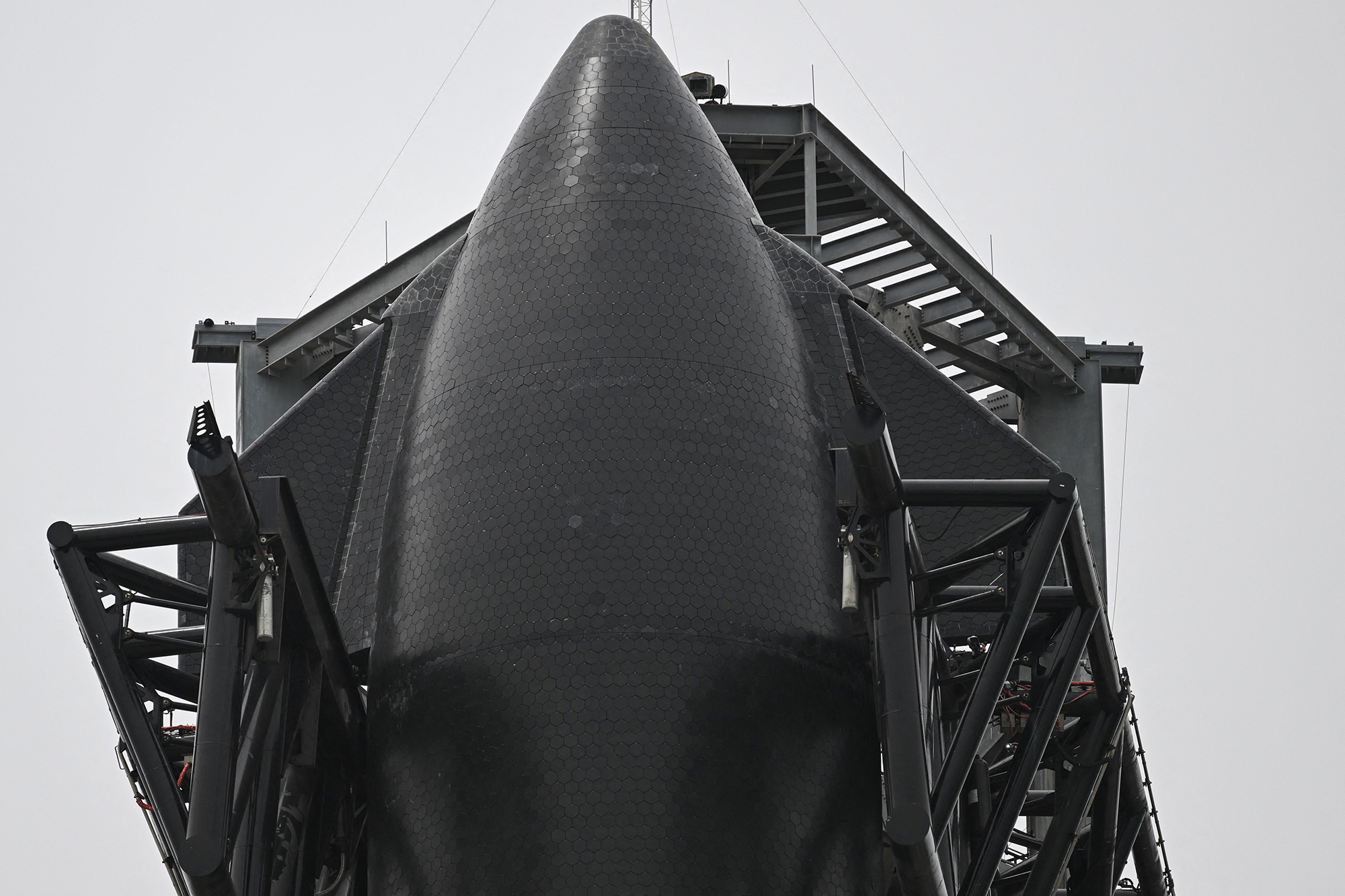 The black tiles of SpaceX's Starship are seen on the launchpad on April 16. 