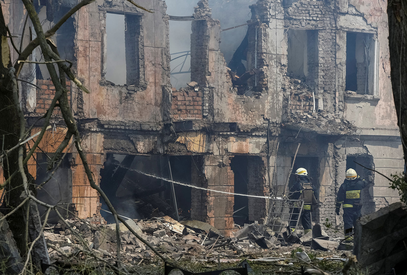 Rescuers work at the site of a clinic heavily destroyed by a Russian missile strike in Dnipro, Ukraine, on May 26. 