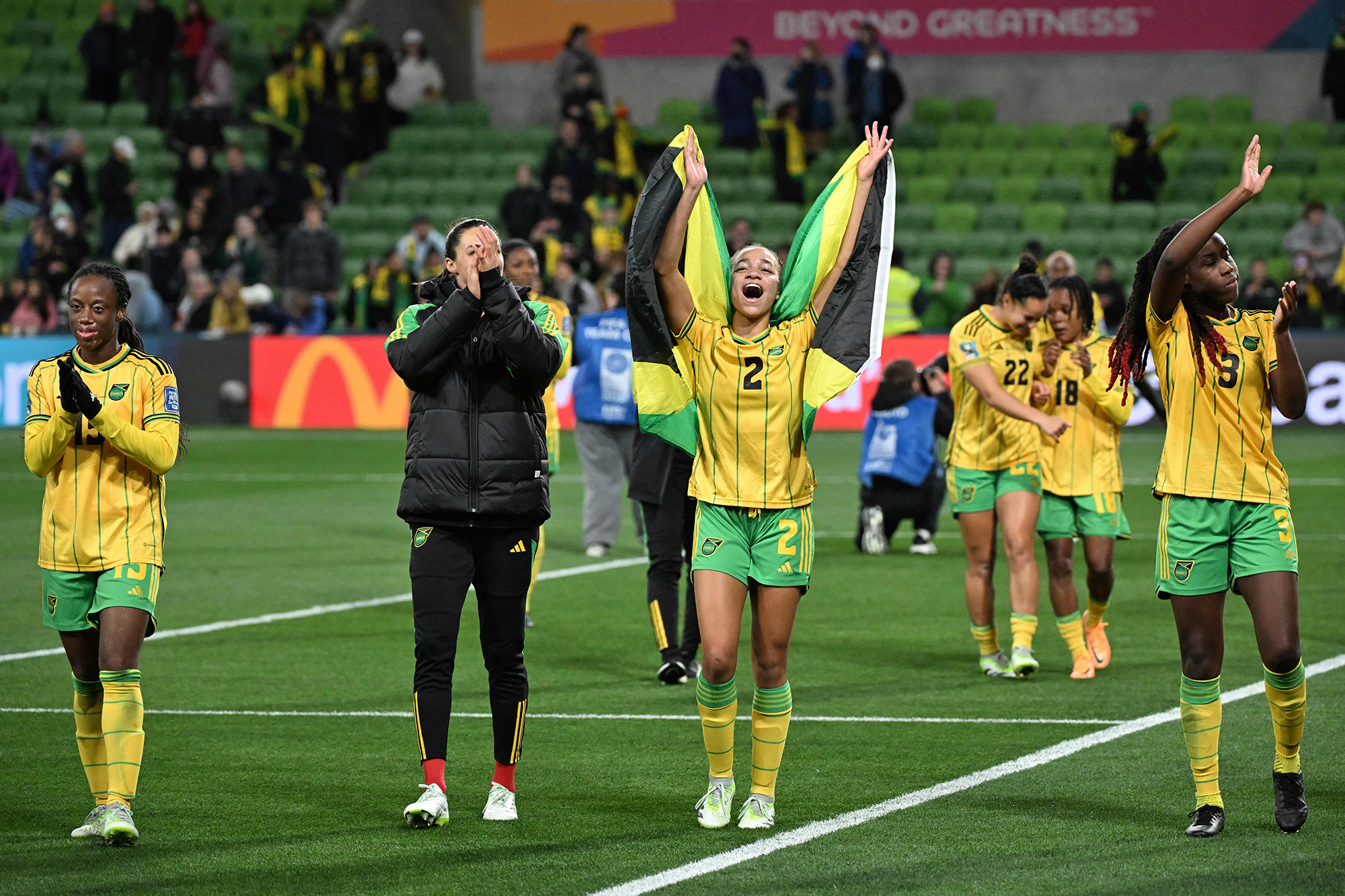Jamaica's players celebrate after qualifying for the last 16 of the Women's World Cup by drawing with Brazil at Melbourne Rectangular Stadium in Australia on August 2.