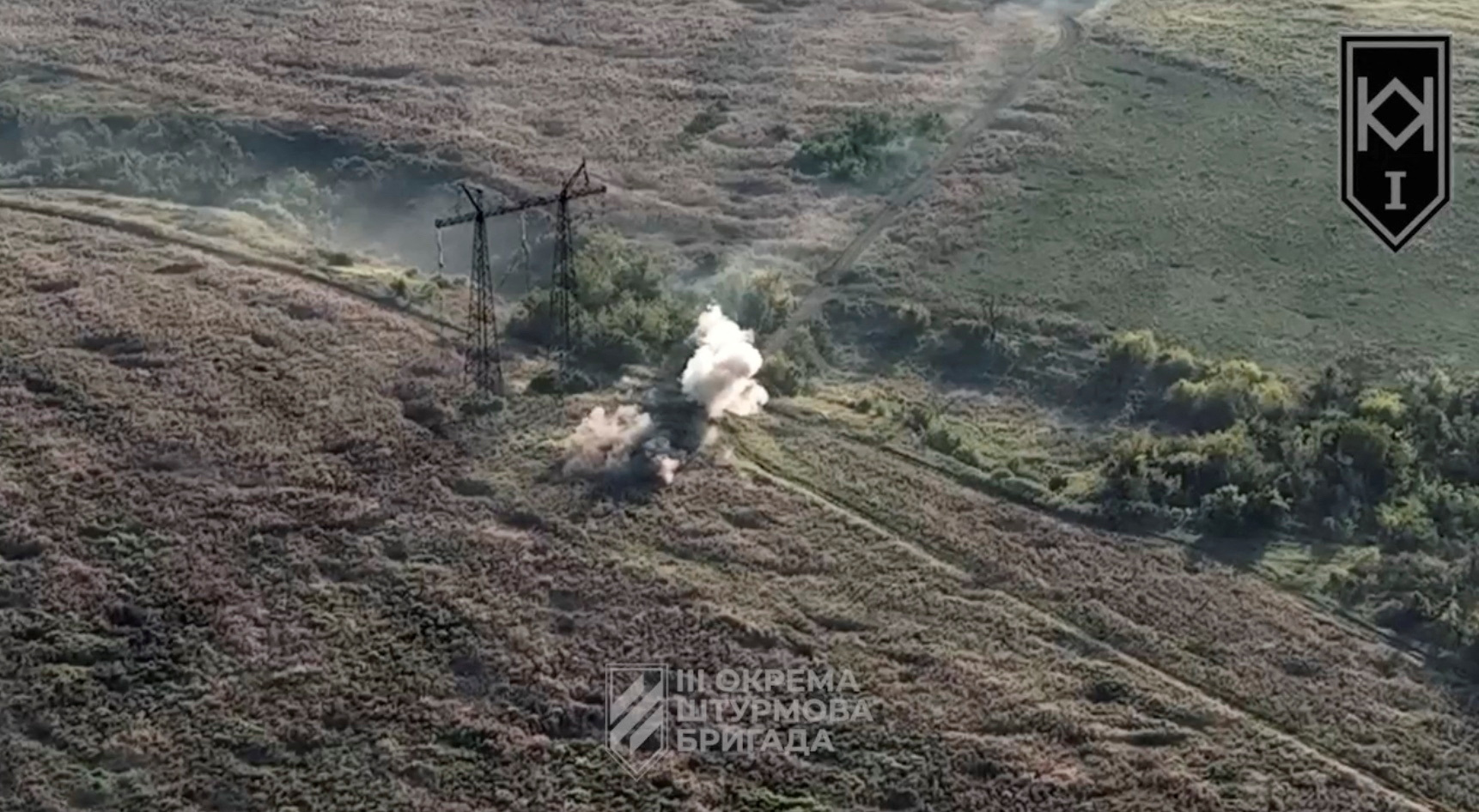 A Russian armored vehicle is purportedly shot by a Ukrainian drone near Andriivka, Donetsk region, Ukraine, in this still image obtained from video released August 22, 2023.