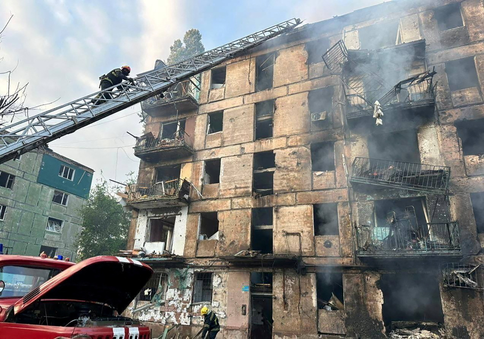 Rescuers work at a site of a residential building heavily damaged by a Russian missile strike in Kryvyi Rih, Dnipropetrovsk region, Ukraine on June 13.