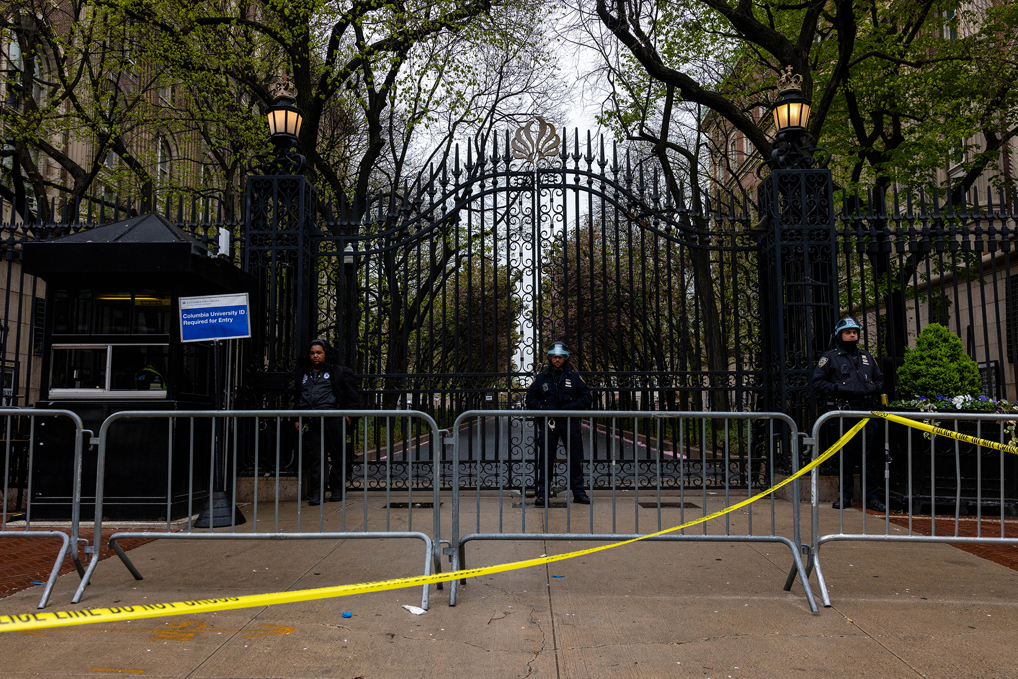 NYPD officers stand by the entrance to Columbia University on April 24 in New York City. 