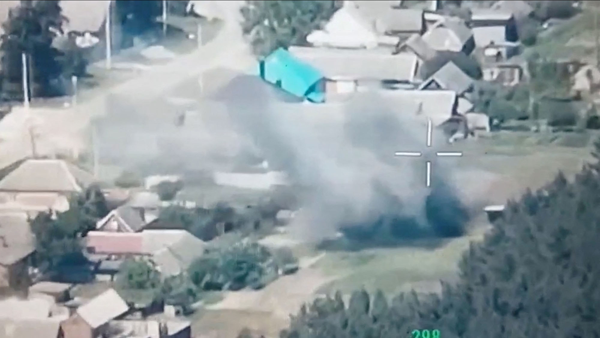 A still image from drone footage released by Freedom of Russia Legion shows, what they claim, is a destruction of Russian military targets, near Novaya Tavolzhanka, Belgorod Region, Russia, in this image obtained from social media released on June 1.