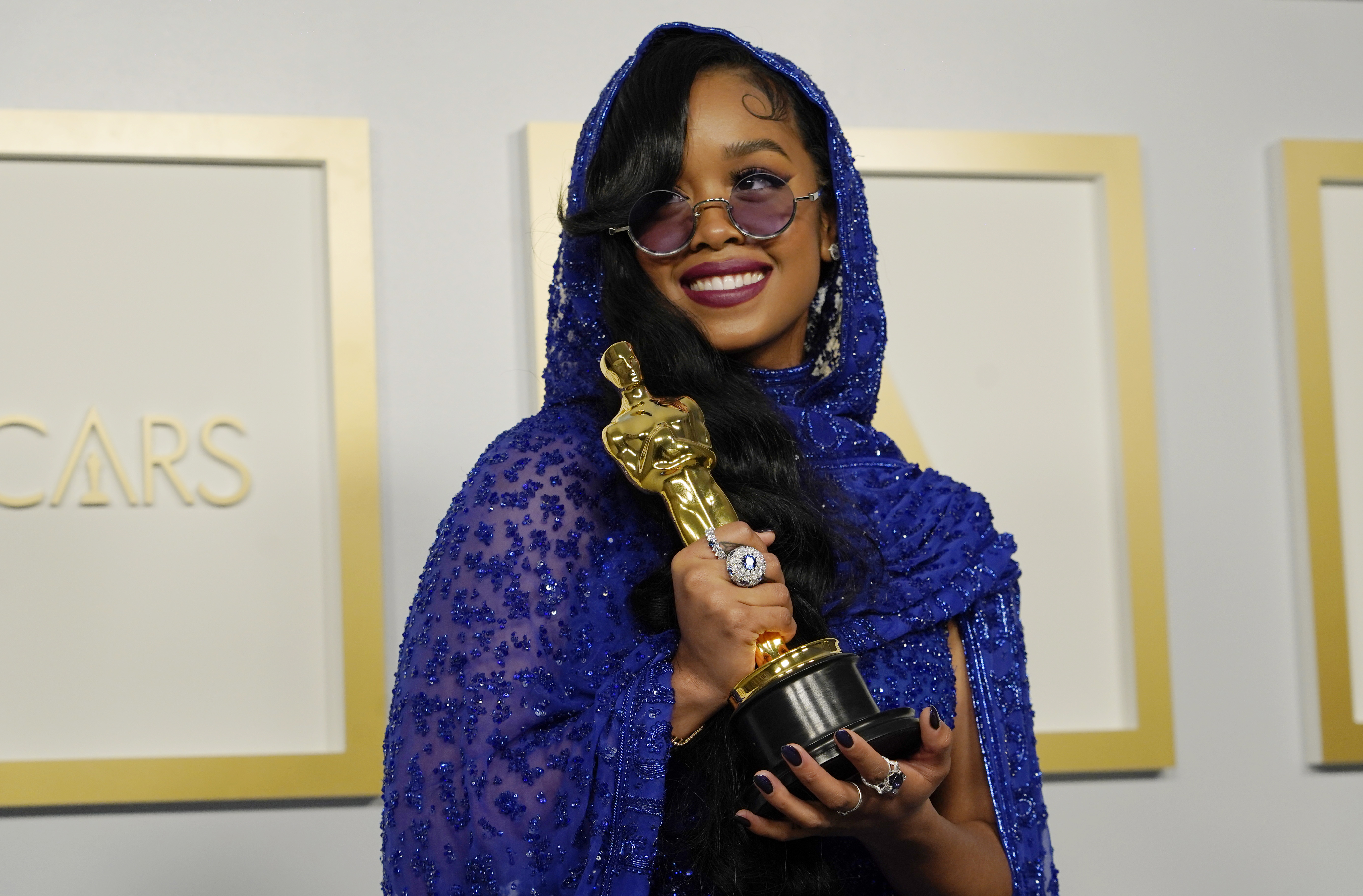 H.E.R. won best original song for "Fight For You" from "Judas and the Black Messiah" at the Oscars on Sunday in Los Angeles.