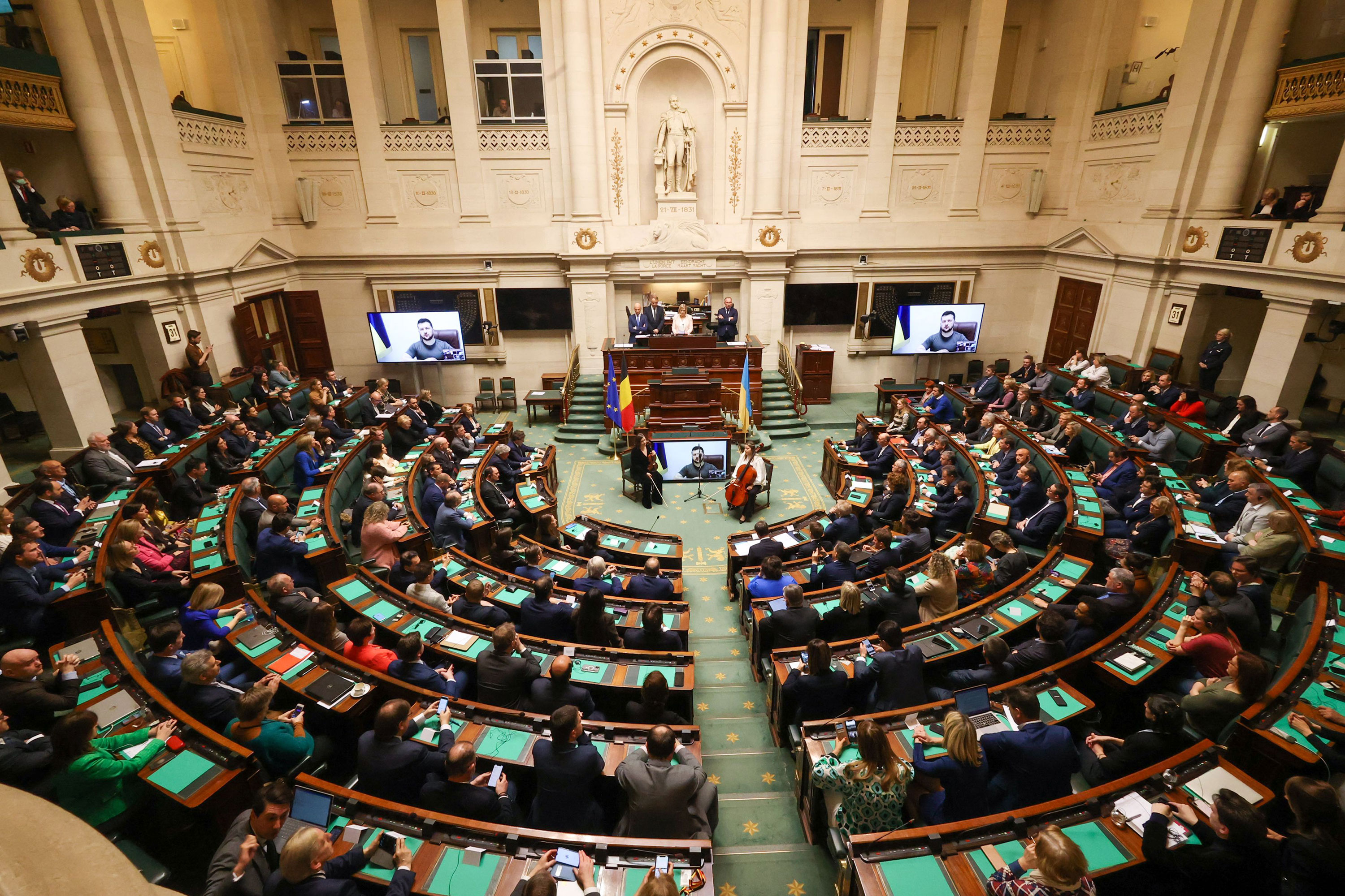 Ukrainian President Volodymyr Zelensky speaks to the Belgian parliament via video conference in Brussels on Thursday.