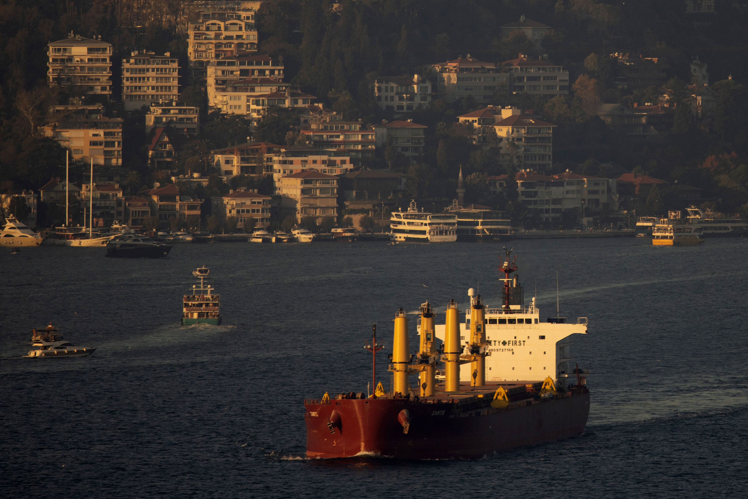 A bulk carrier hauling Ukrainian grain transits the Bosphorus strait in Istanbul on November 2, 2022. 
