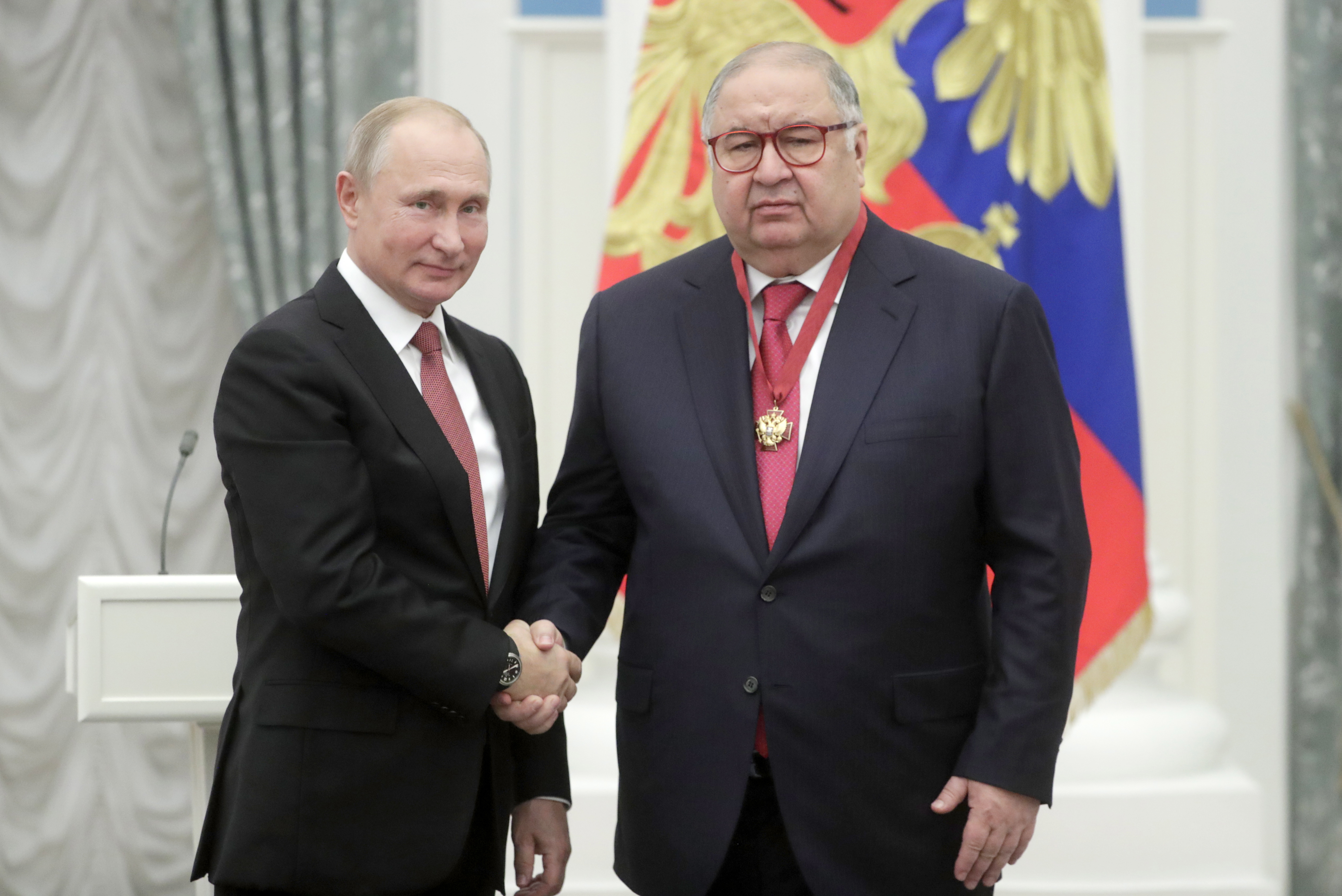 Businessman, Alisher Usmanov (R), receives Russia's Order of Merit for the Fatherland (3rd class) from the President of Russia, Vladimir Putin, at a ceremony in the Kremlin, in Moscow, Russia, on November 27, 2018.