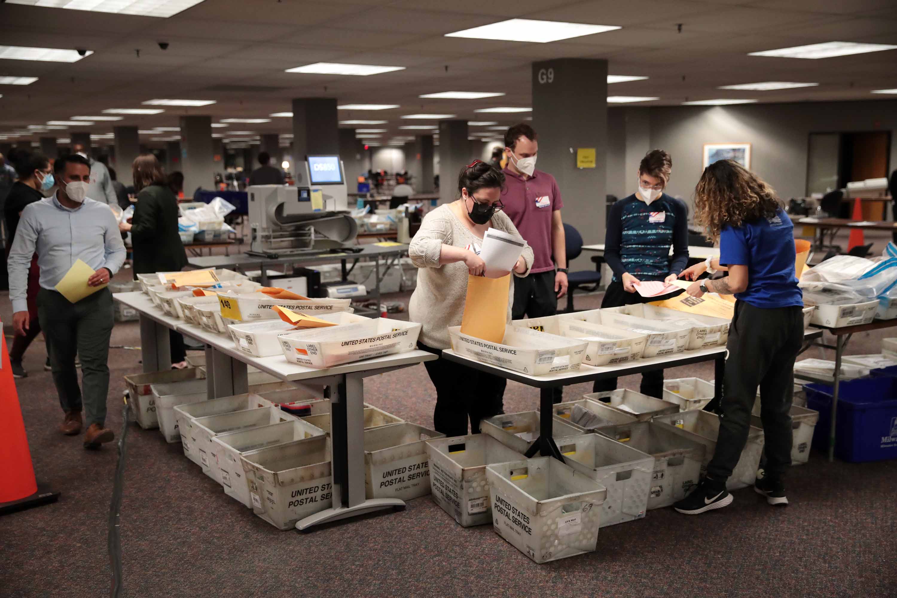 Election officials count absentee ballots in Milwaukee, Wisconsin, early on November 4.