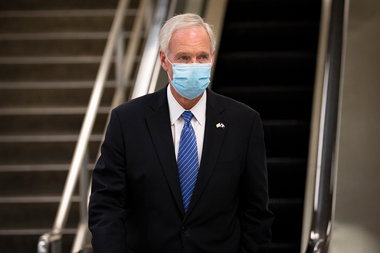 Sen. Ron Johnson, R-Wisc., walks through the Senate subway after a vote on the Senate floor at the Capitol in Washington on Thursday, Oct. 1, 2020. 