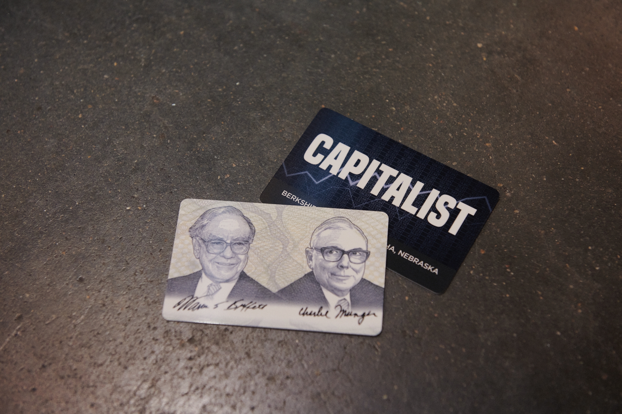 Warren Buffet, left, and Charlie Munger on capitalist cards offered during a shareholders shopping day ahead of the Berkshire Hathaway annual meeting in Omaha, Nebraska, on Friday, April 29.