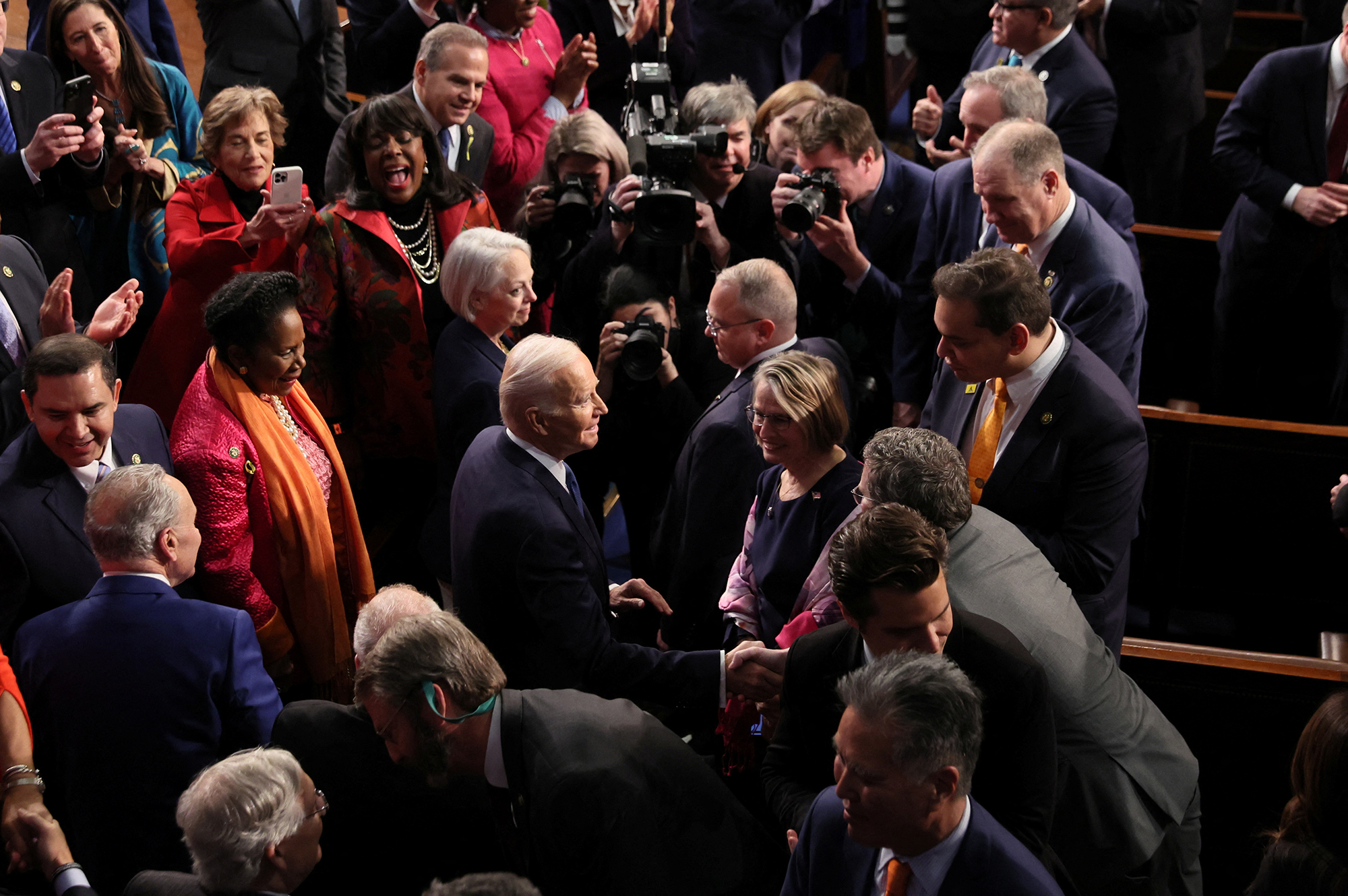 Rep. George Santos watches as Biden arrives to deliver his State of the Union address.