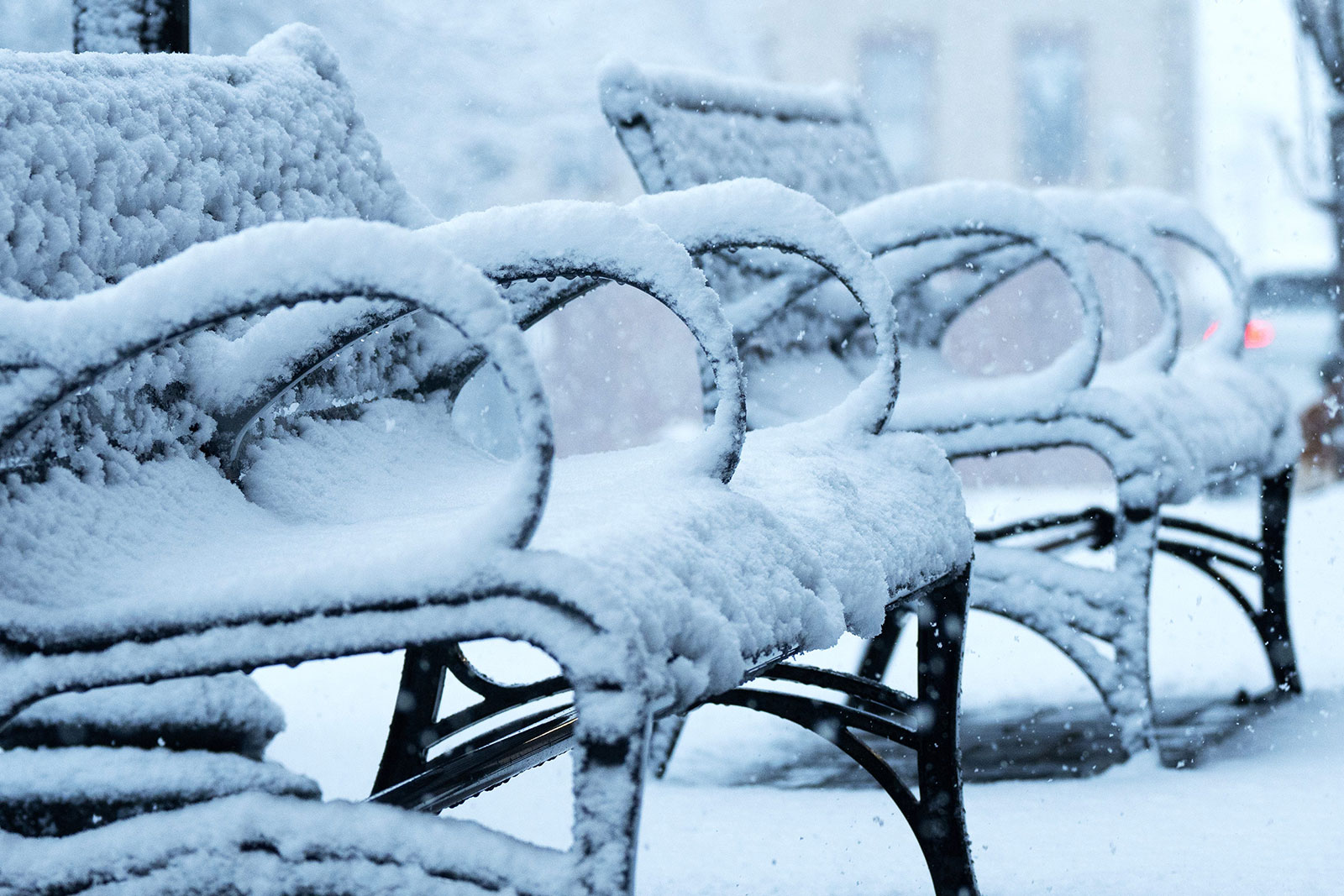 Park benches are packed with snow in Hackensack, New Jersey, on Tuesday.